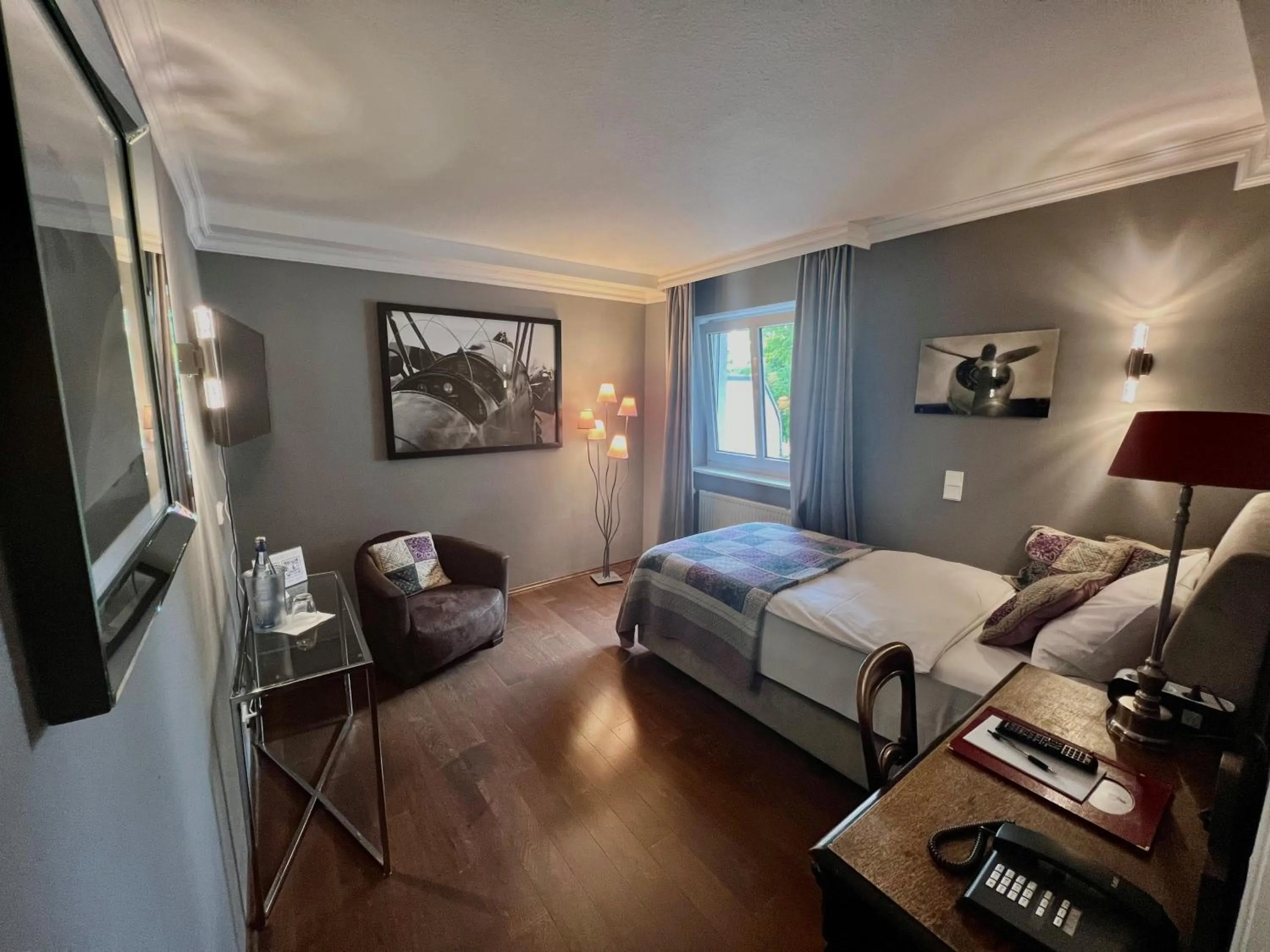 Bed in Hotel Ashley's Garden