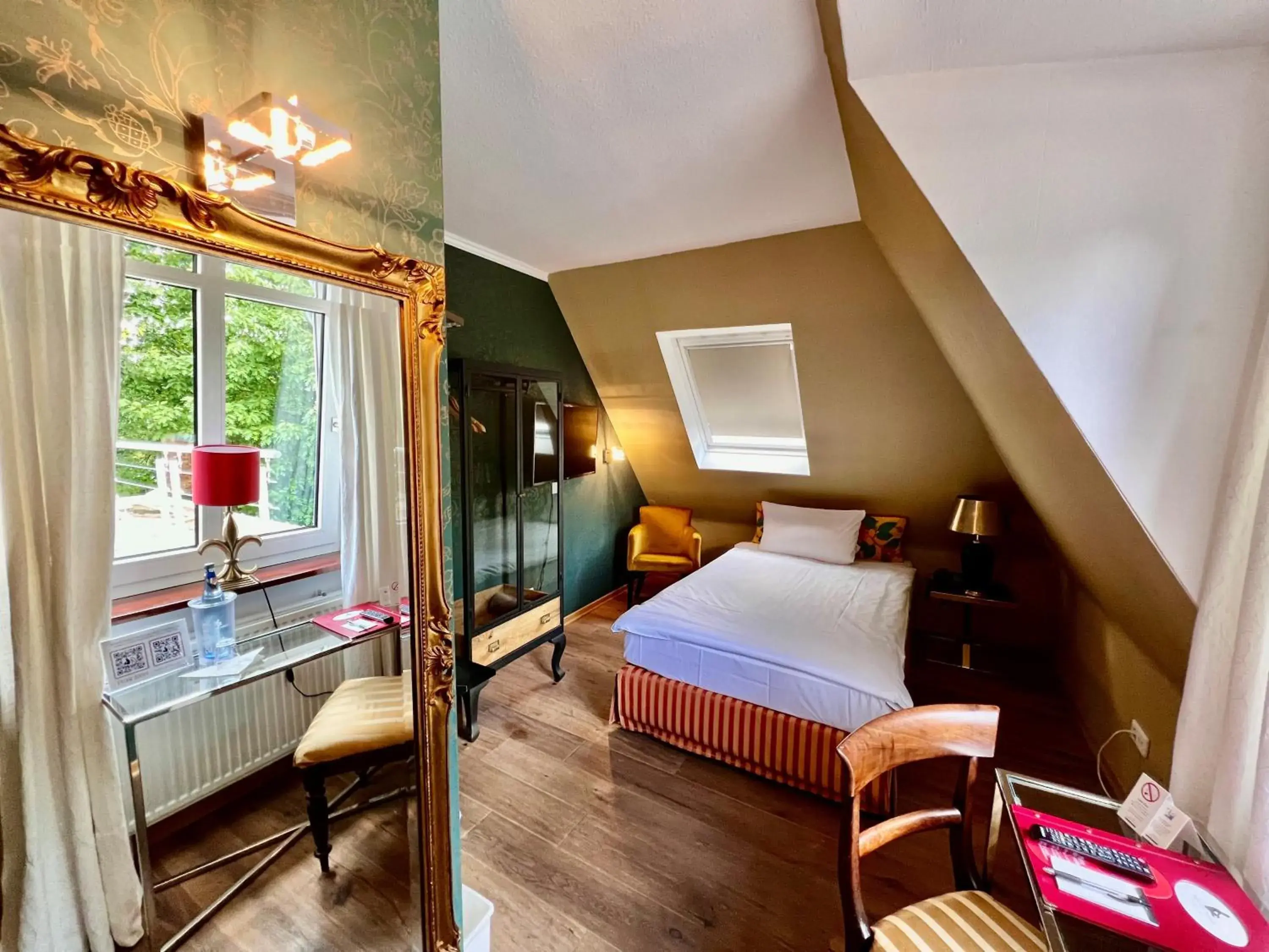 Bed in Hotel Ashley's Garden Bed in Hotel Ashley's Garden