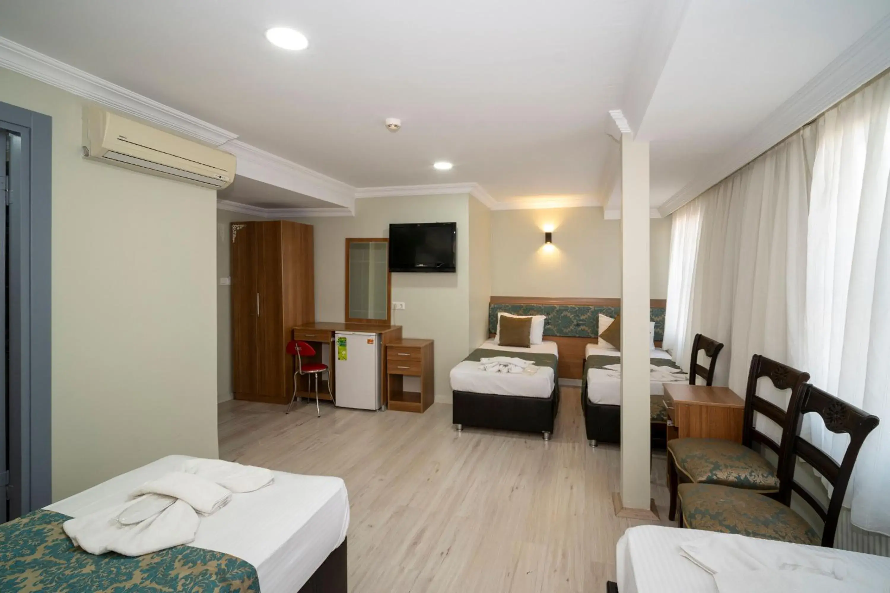 Quadruple Room in Hotel Simper Quadruple Room in Hotel Simper