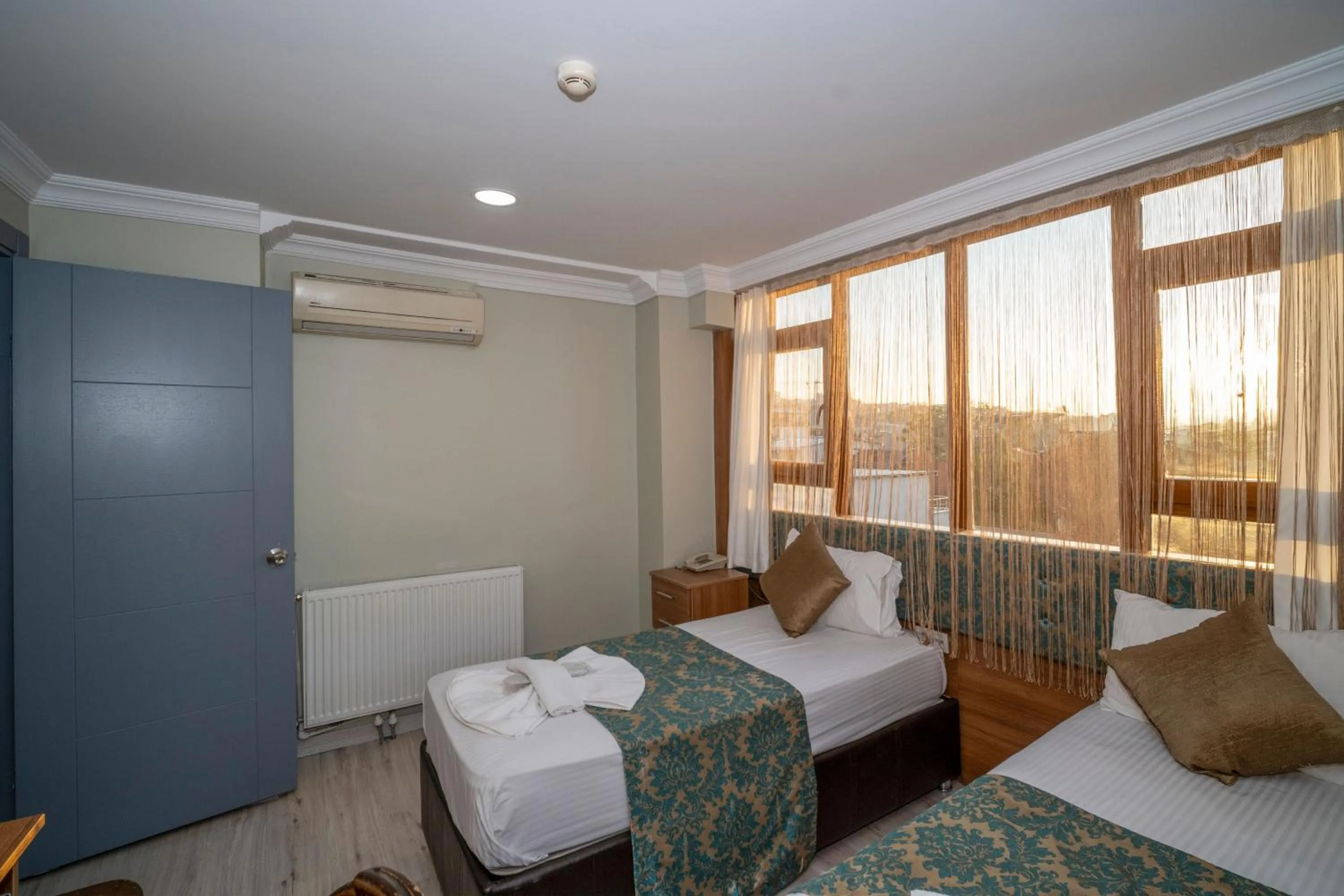 Bed in Hotel Simper