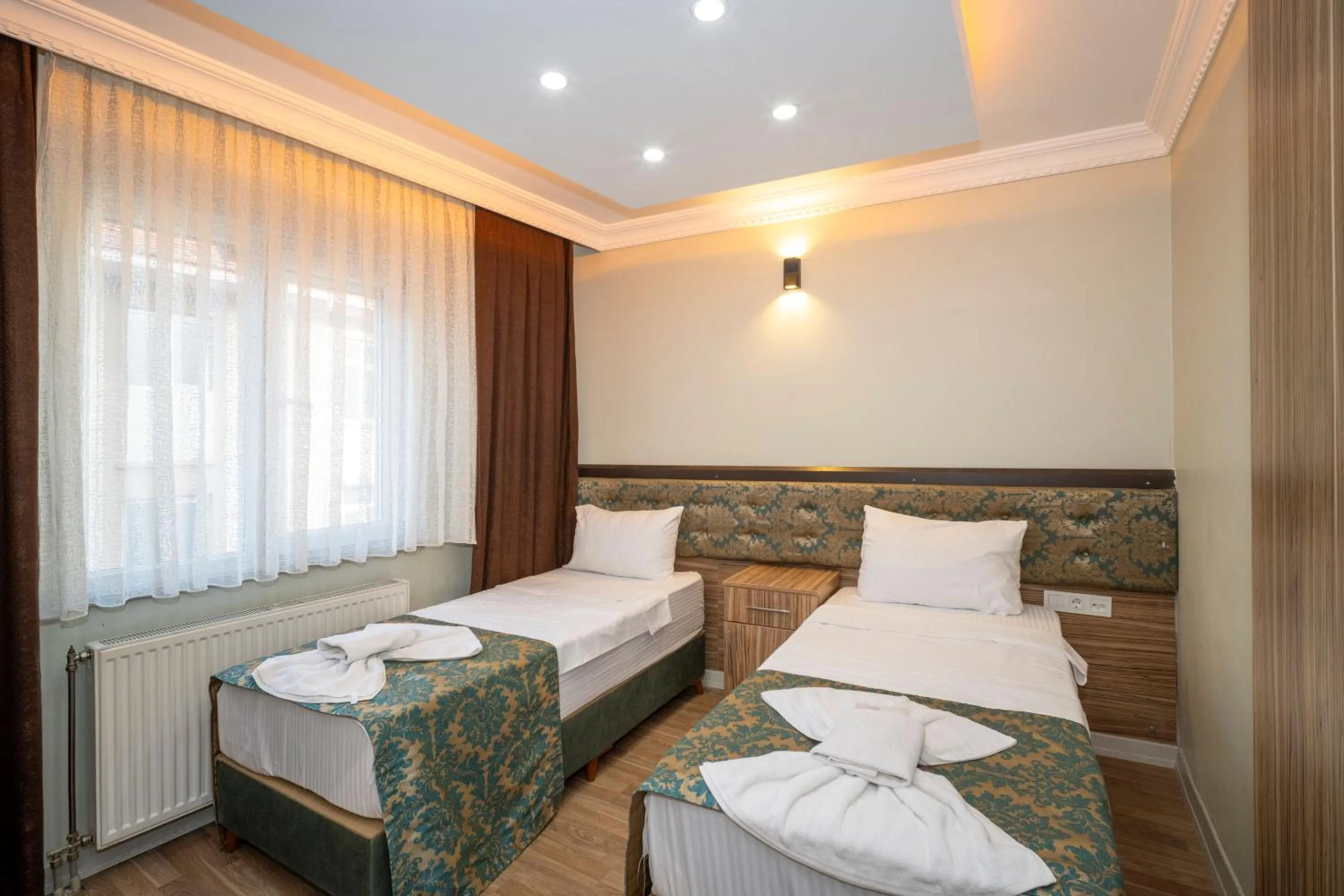 Bed in Hotel Simper