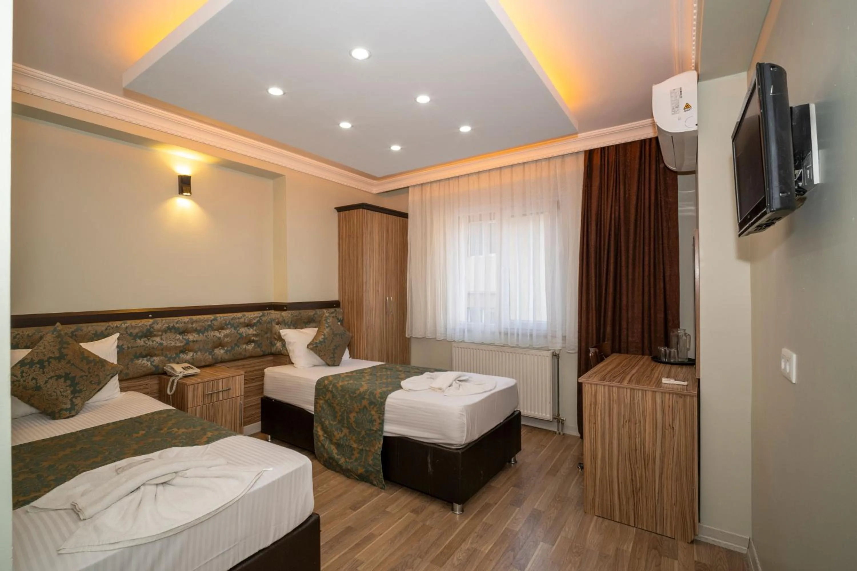 Bed in Hotel Simper