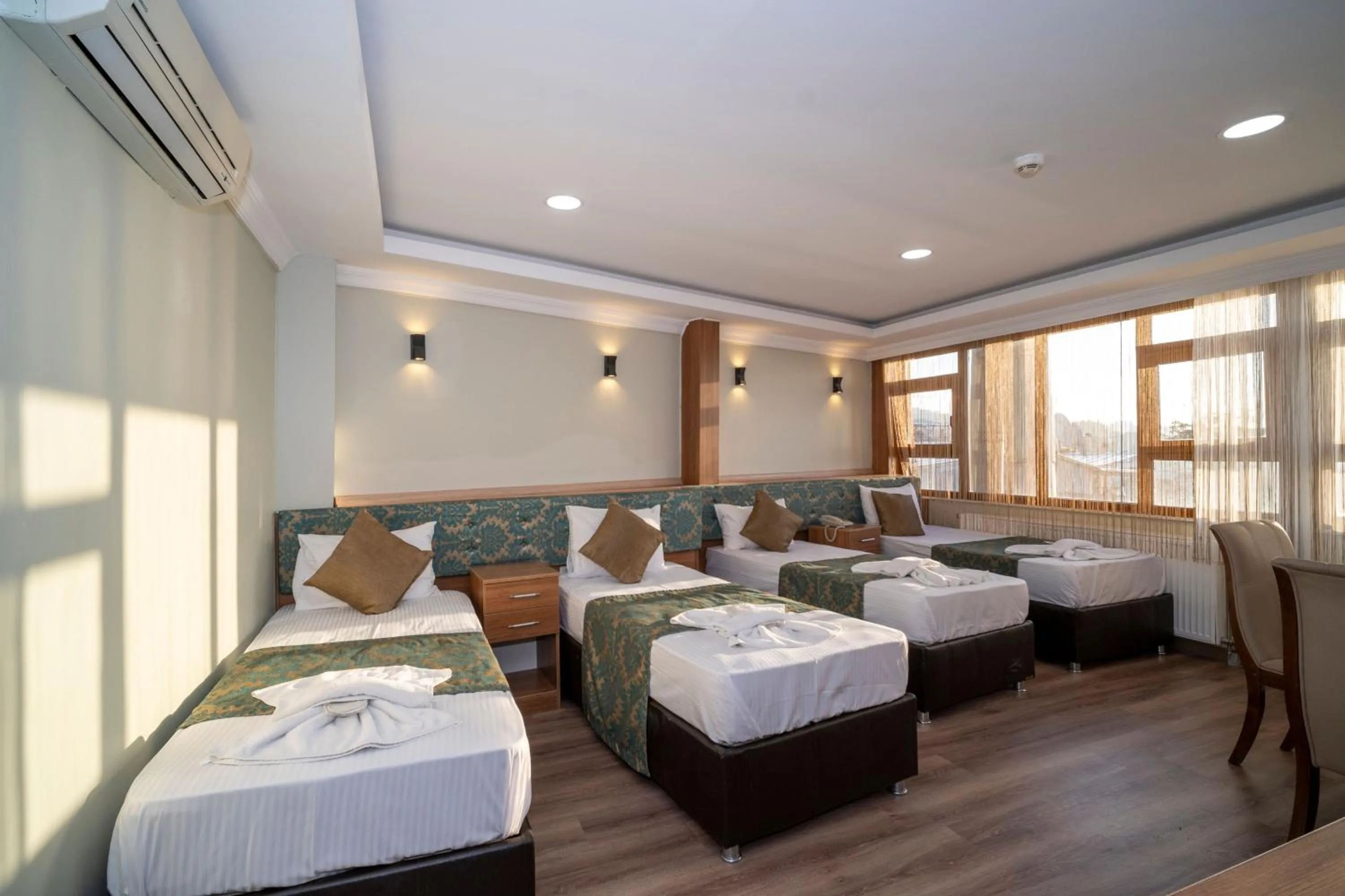 Bed in Hotel Simper