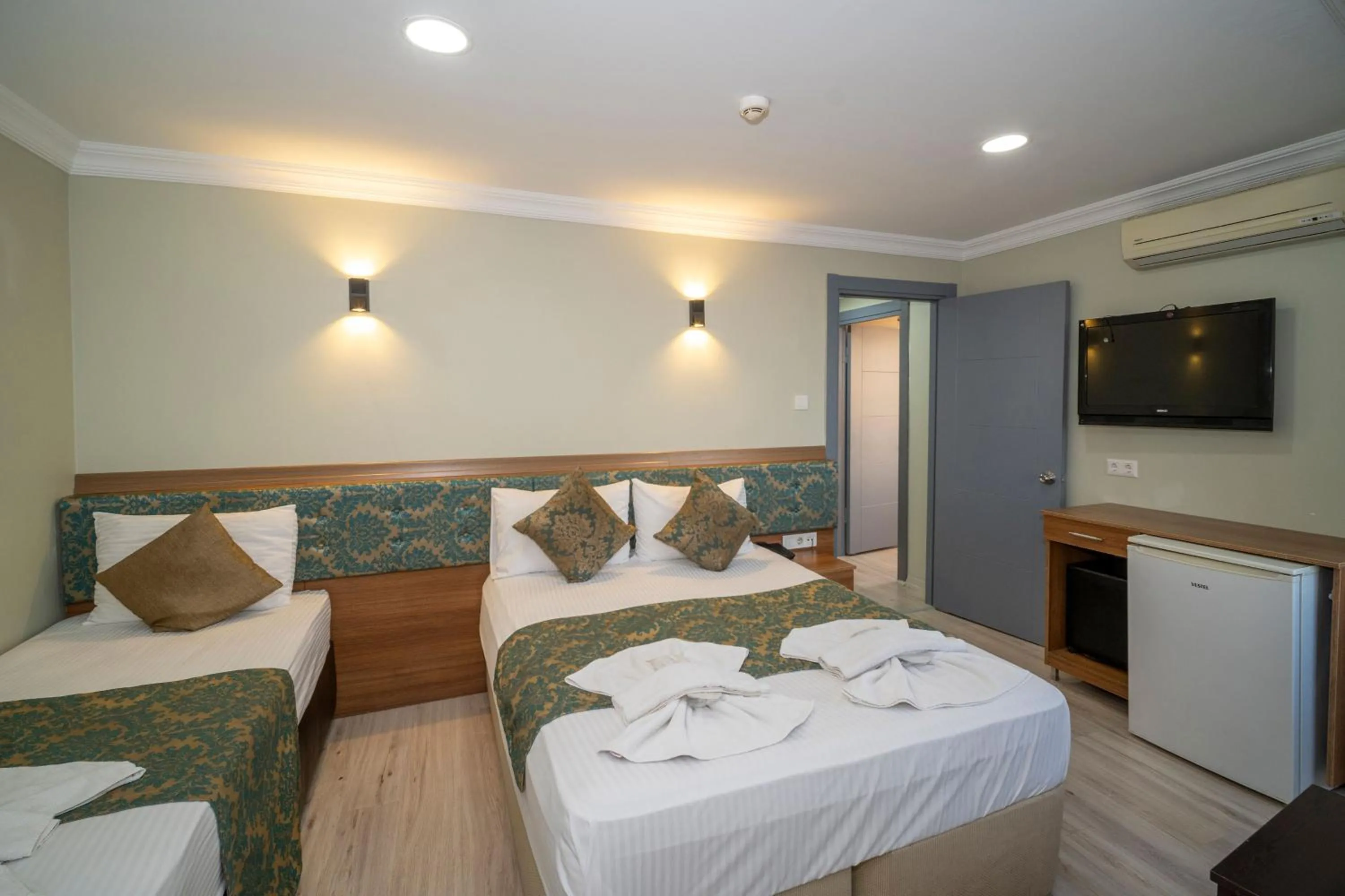 Bed in Hotel Simper