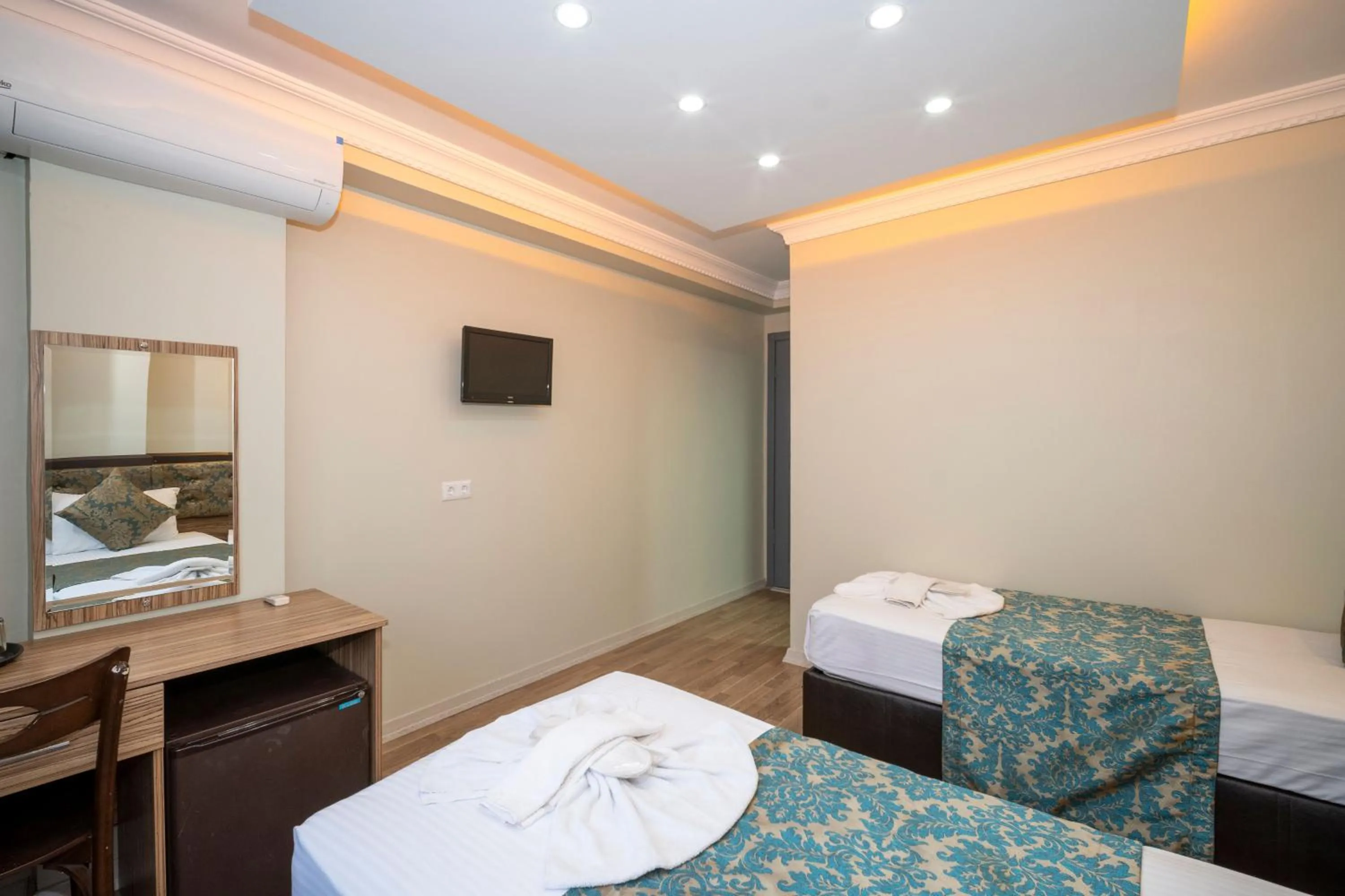 Bed in Hotel Simper