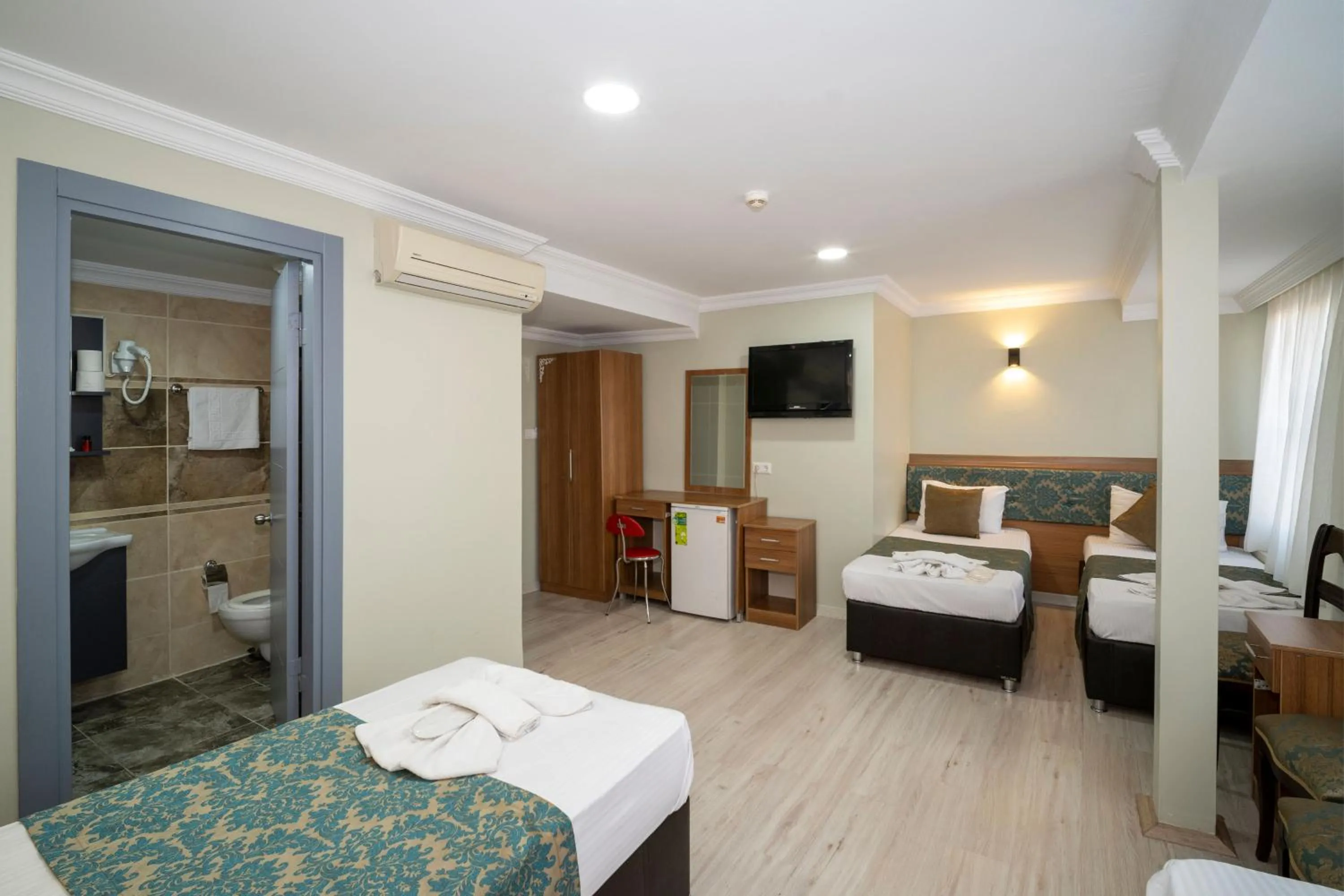 Bed in Hotel Simper