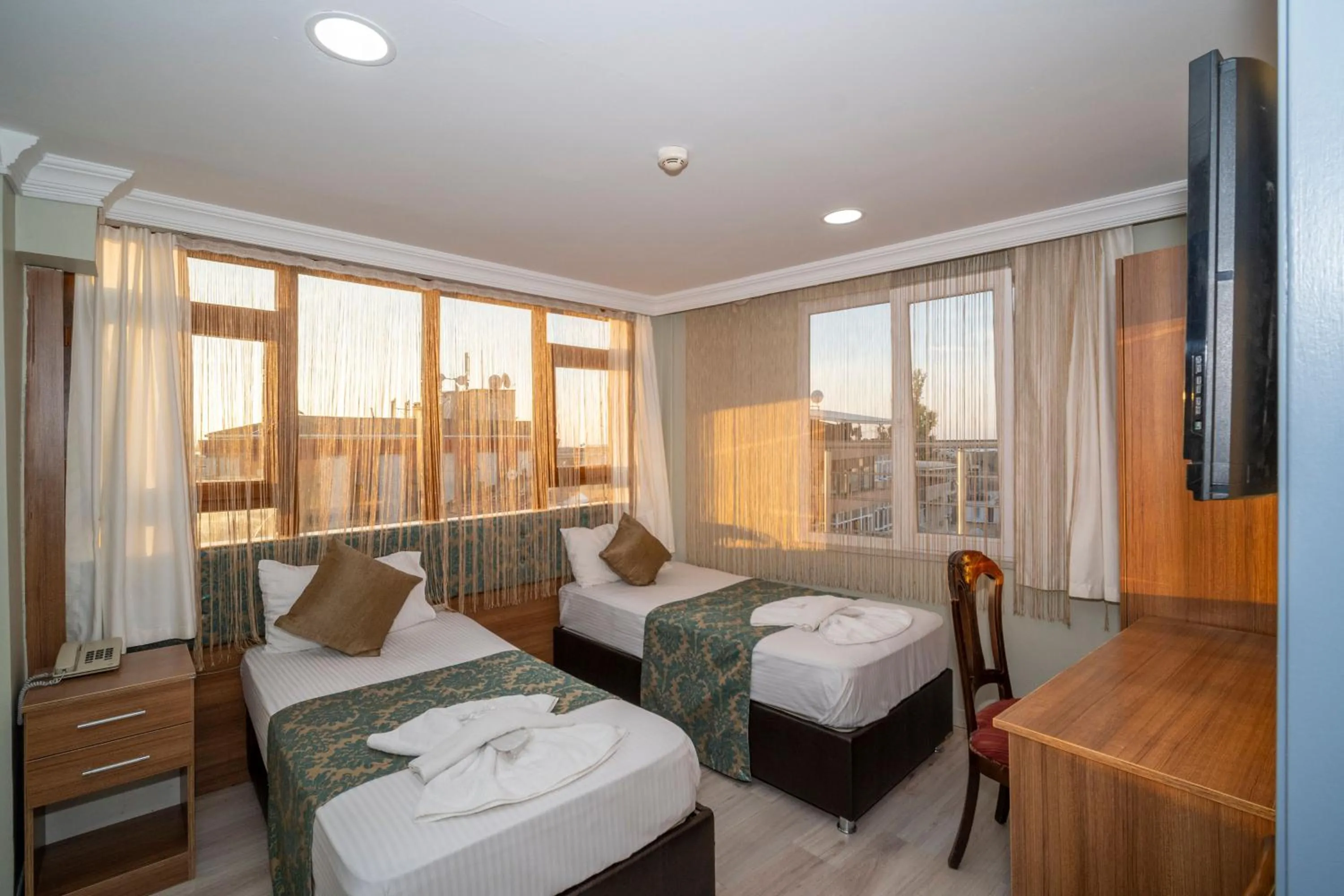 Bed in Hotel Simper