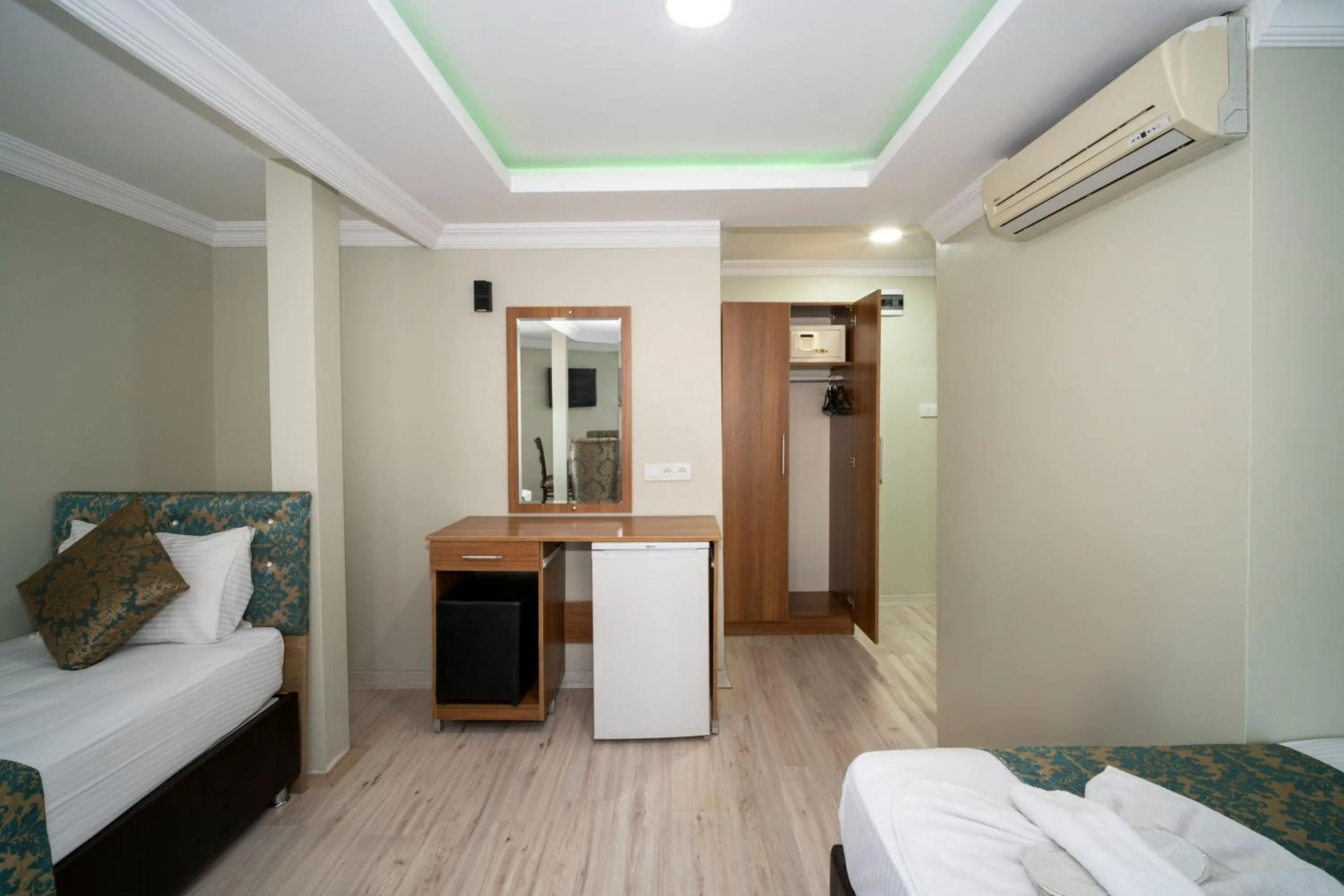 Bed in Hotel Simper