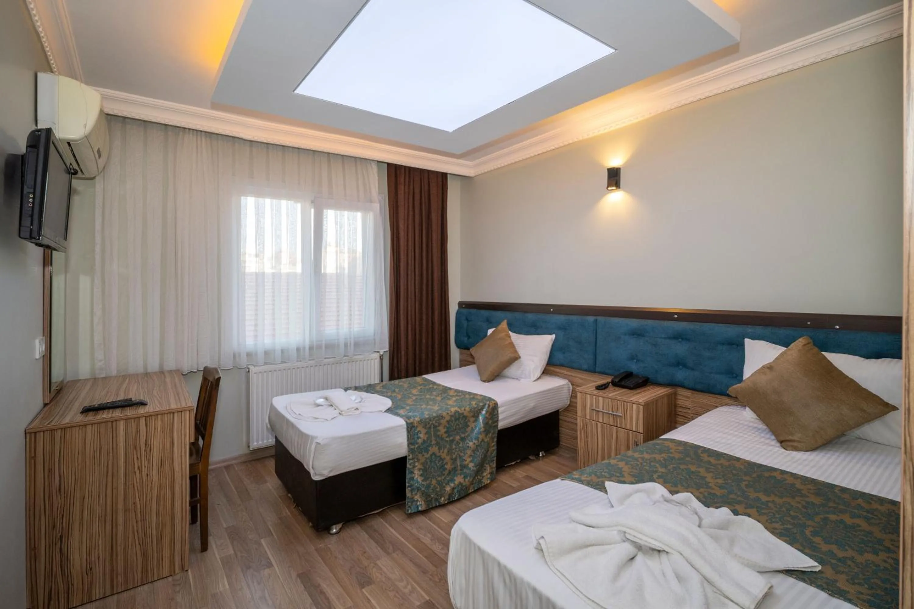 Bed in Hotel Simper