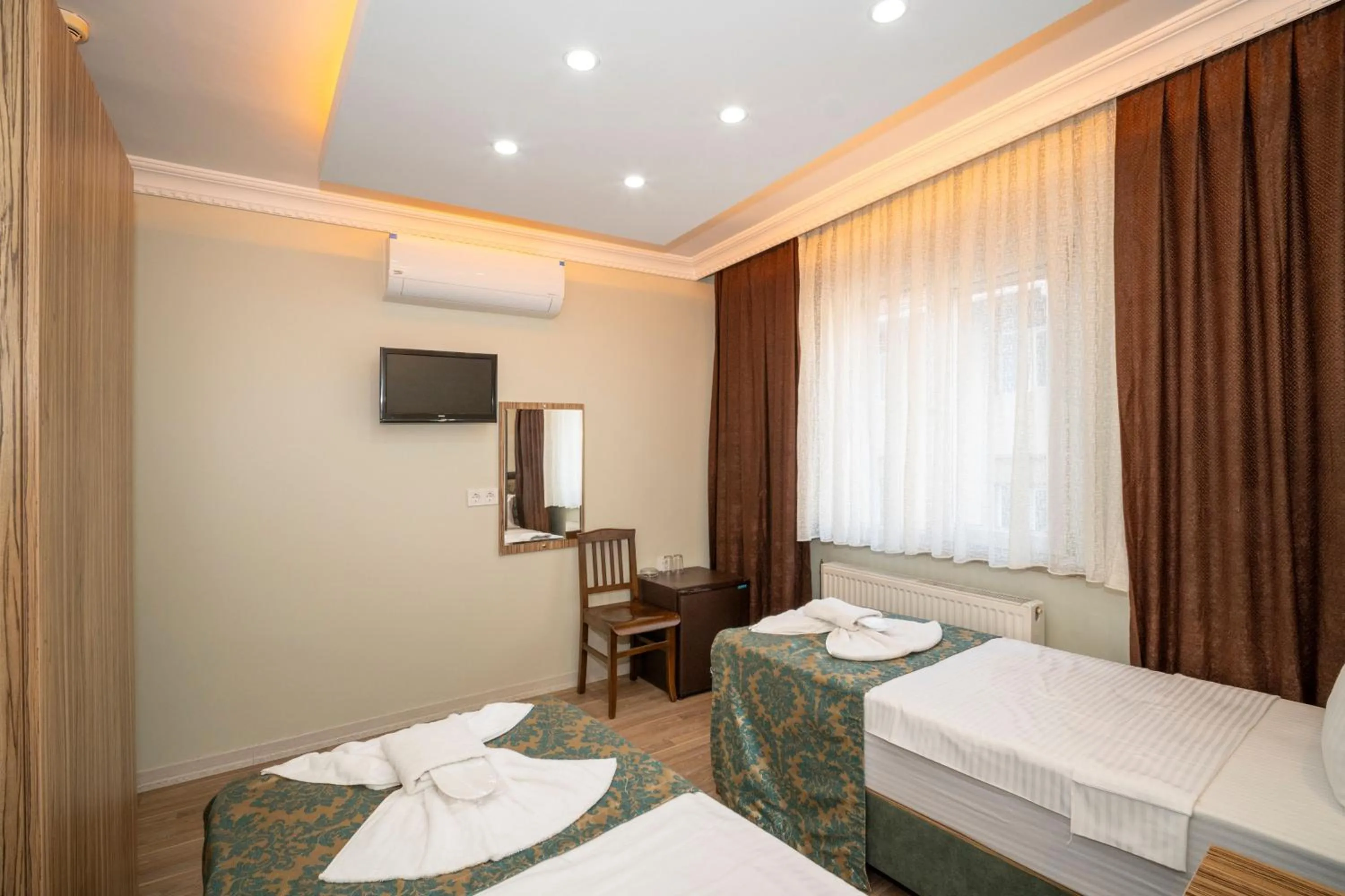 Bed in Hotel Simper