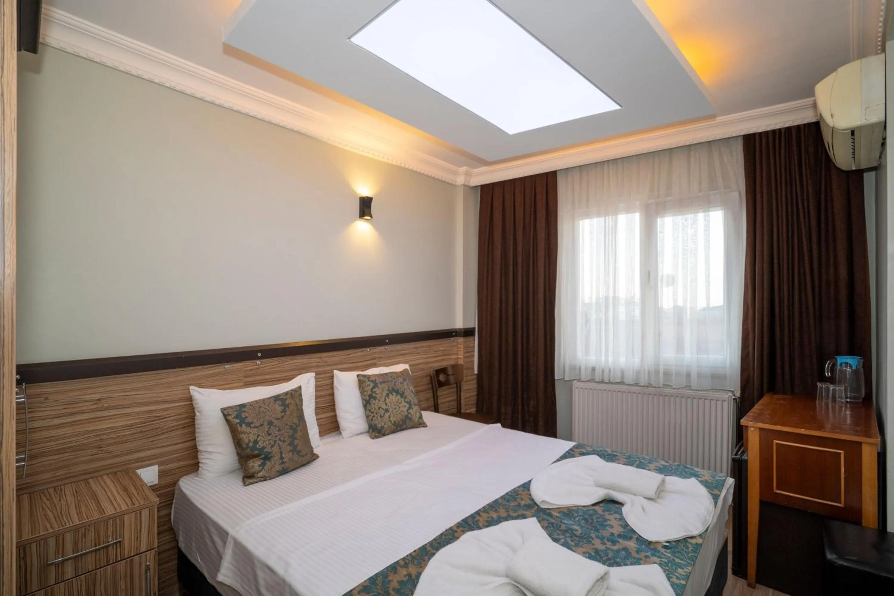 Bed in Hotel Simper