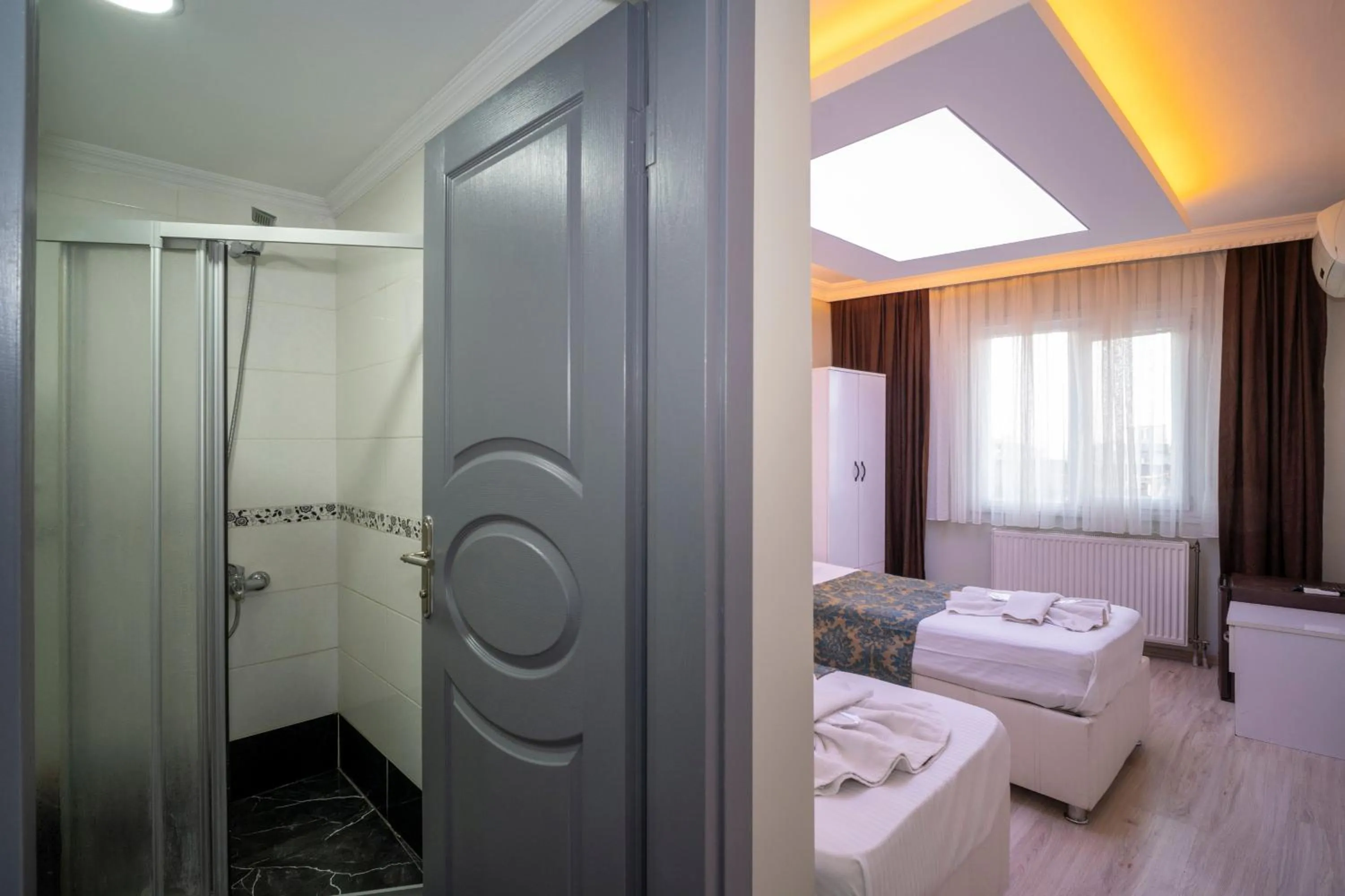 Bed in Hotel Simper