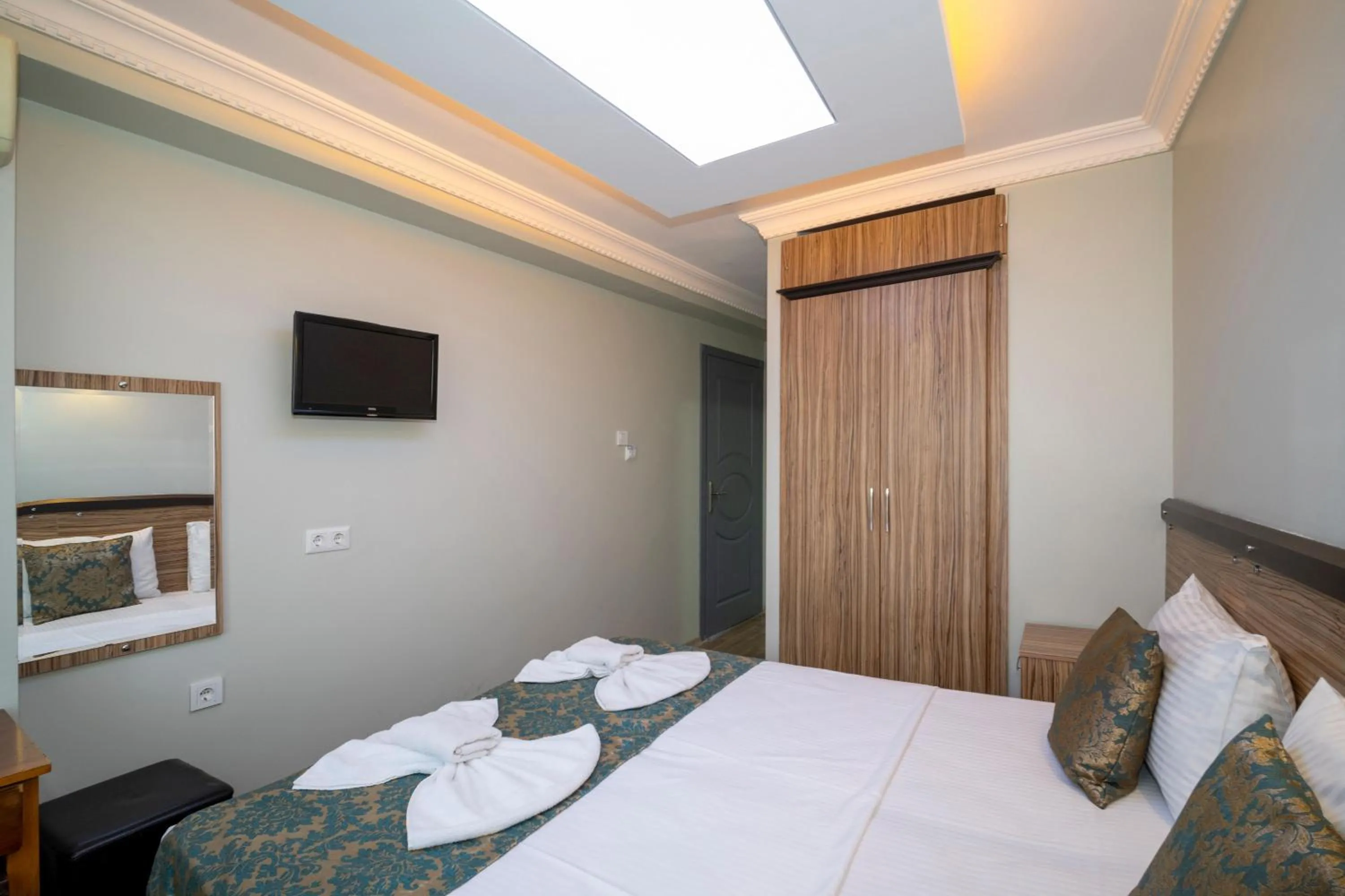 Bed in Hotel Simper