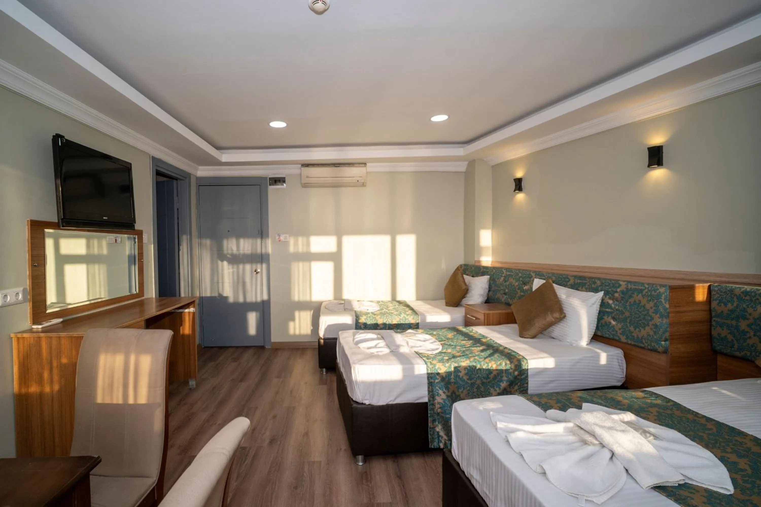 Bed in Hotel Simper