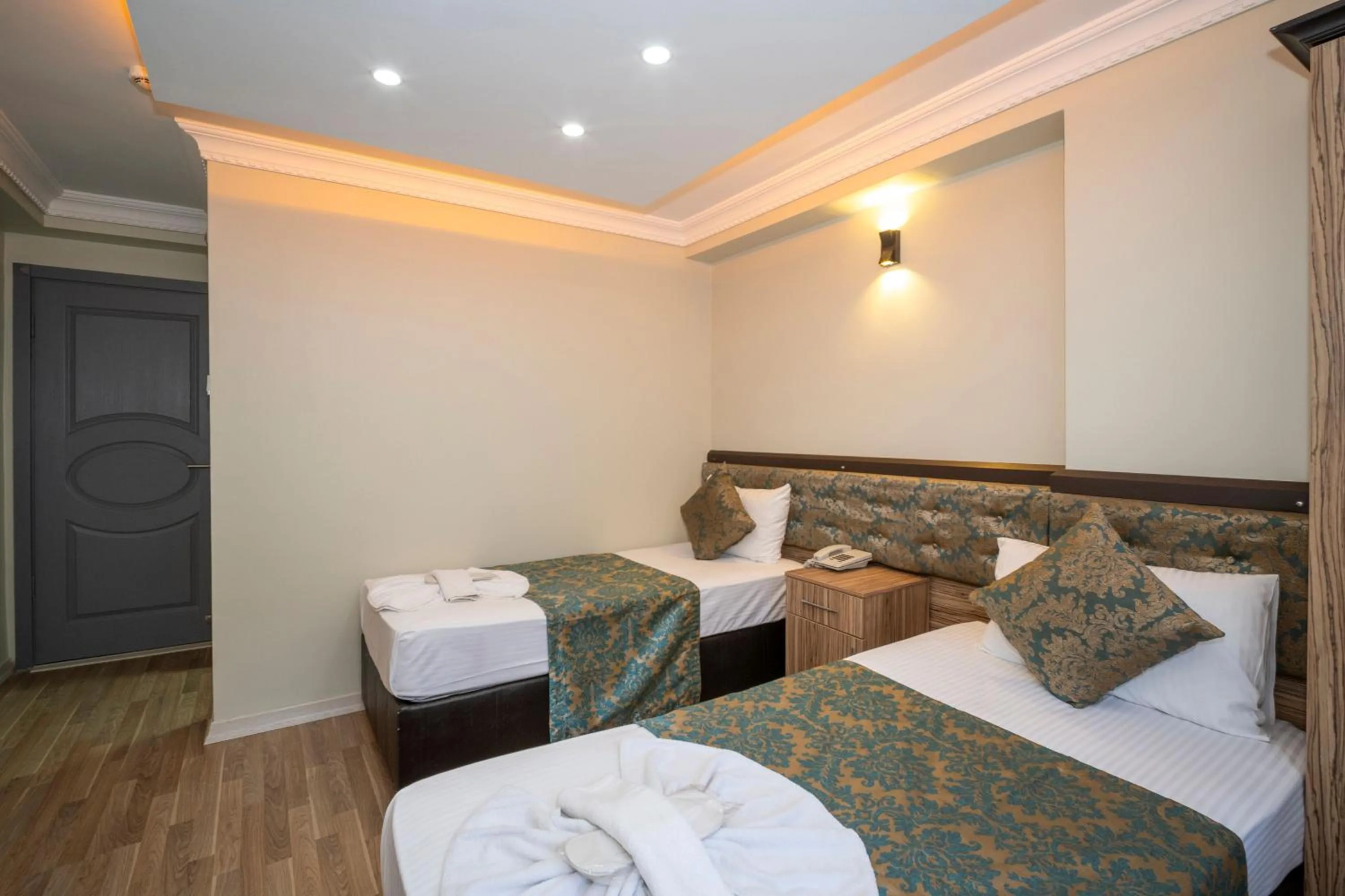 Bed in Hotel Simper