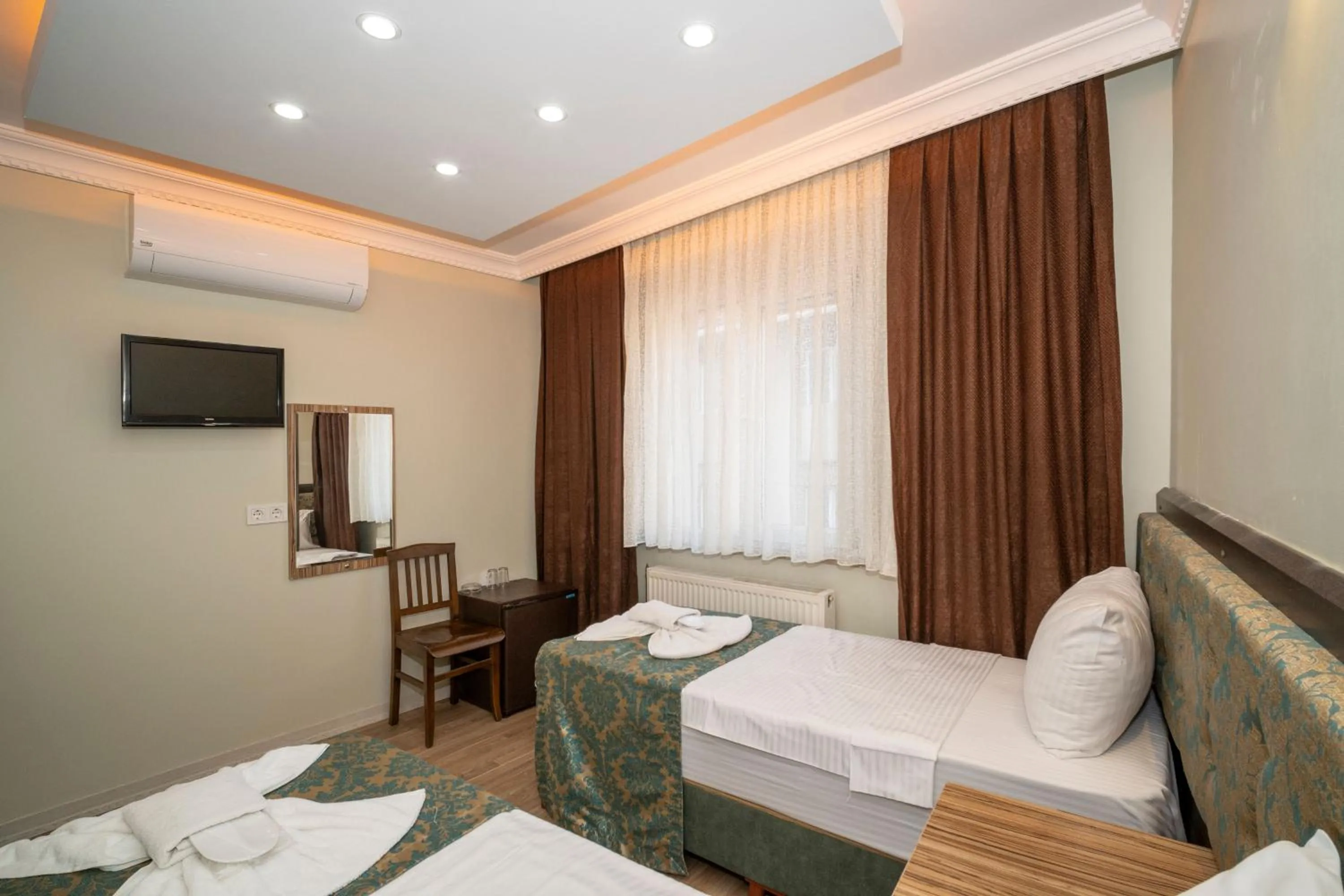 Bed in Hotel Simper