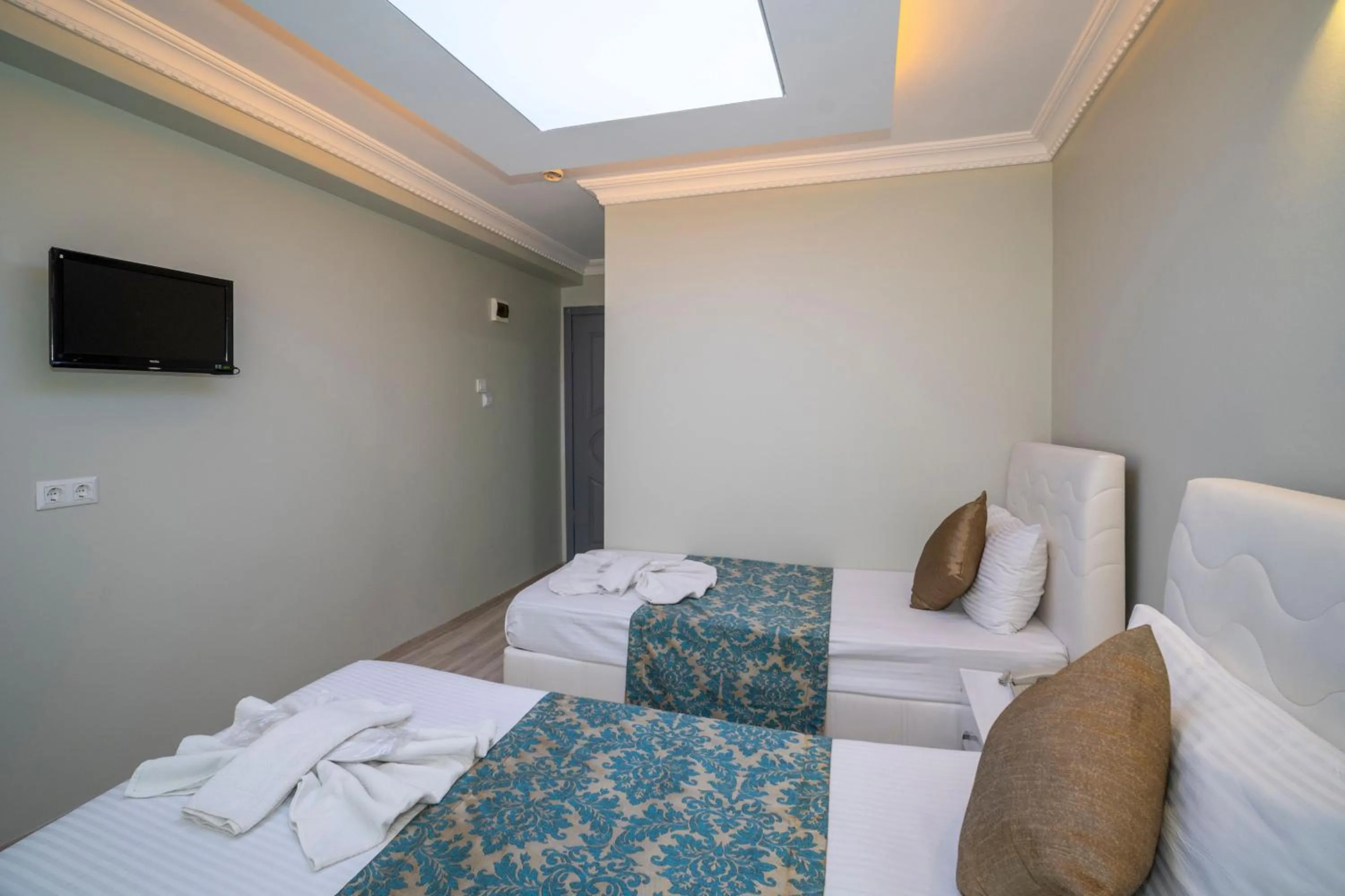 Bed in Hotel Simper