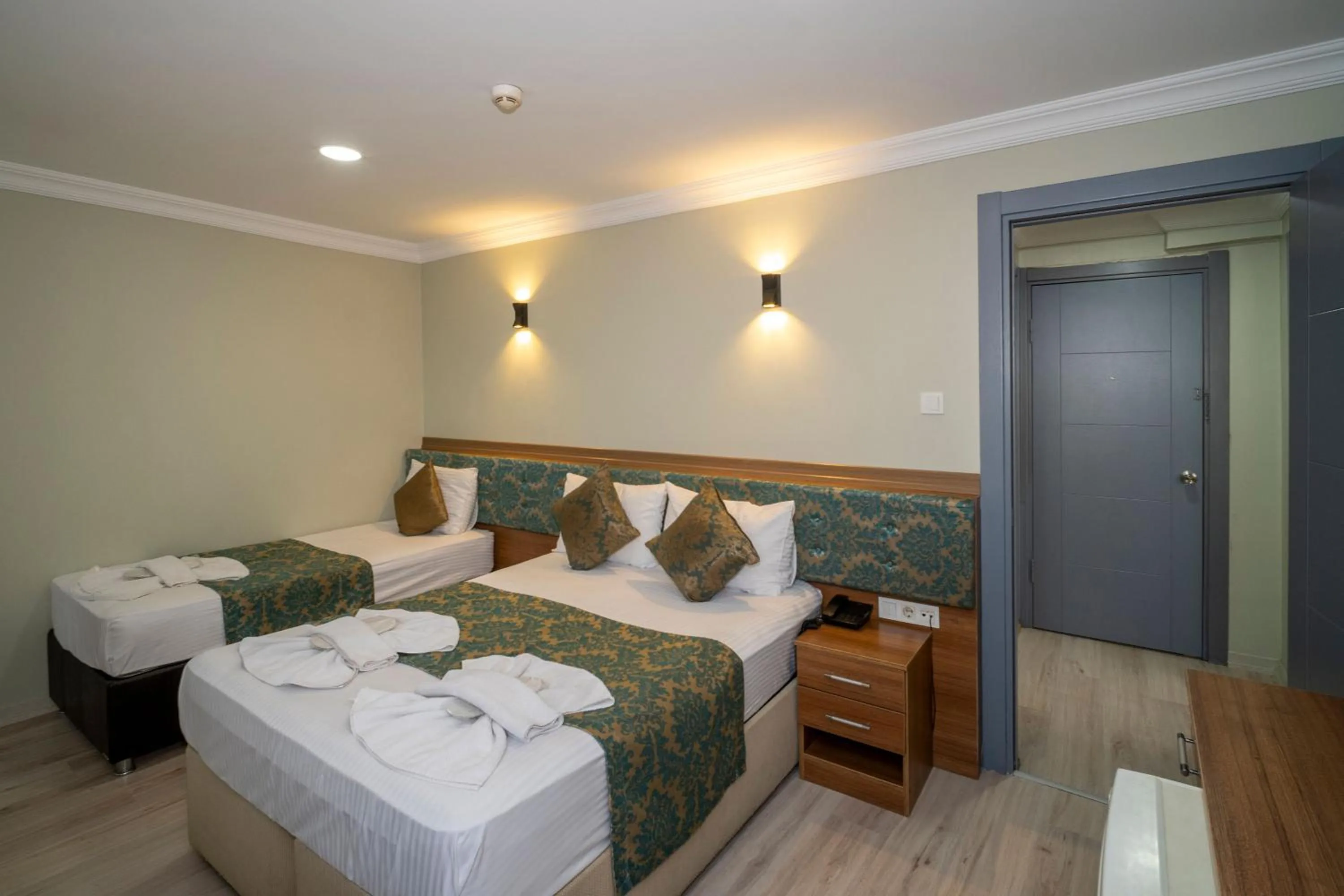 Bed in Hotel Simper