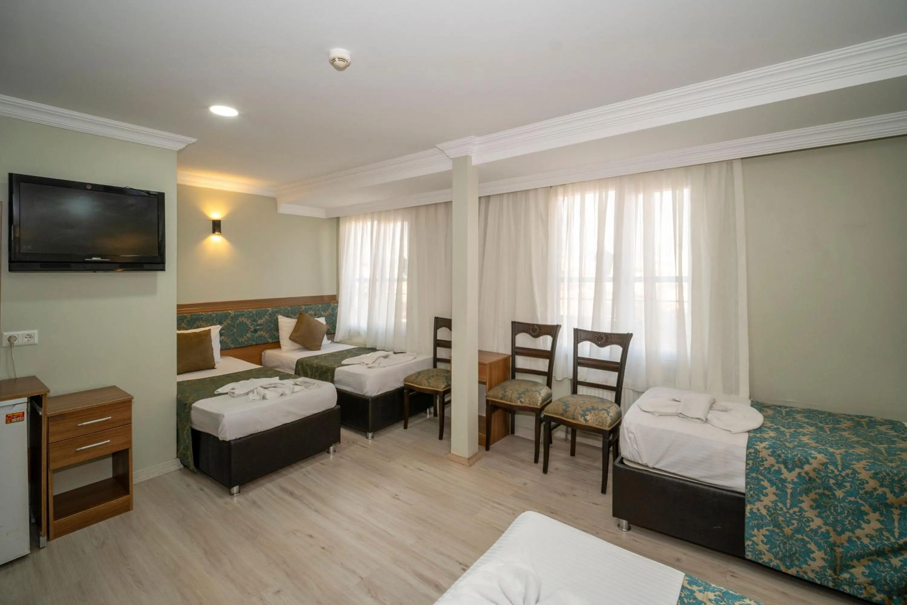 Bed in Hotel Simper