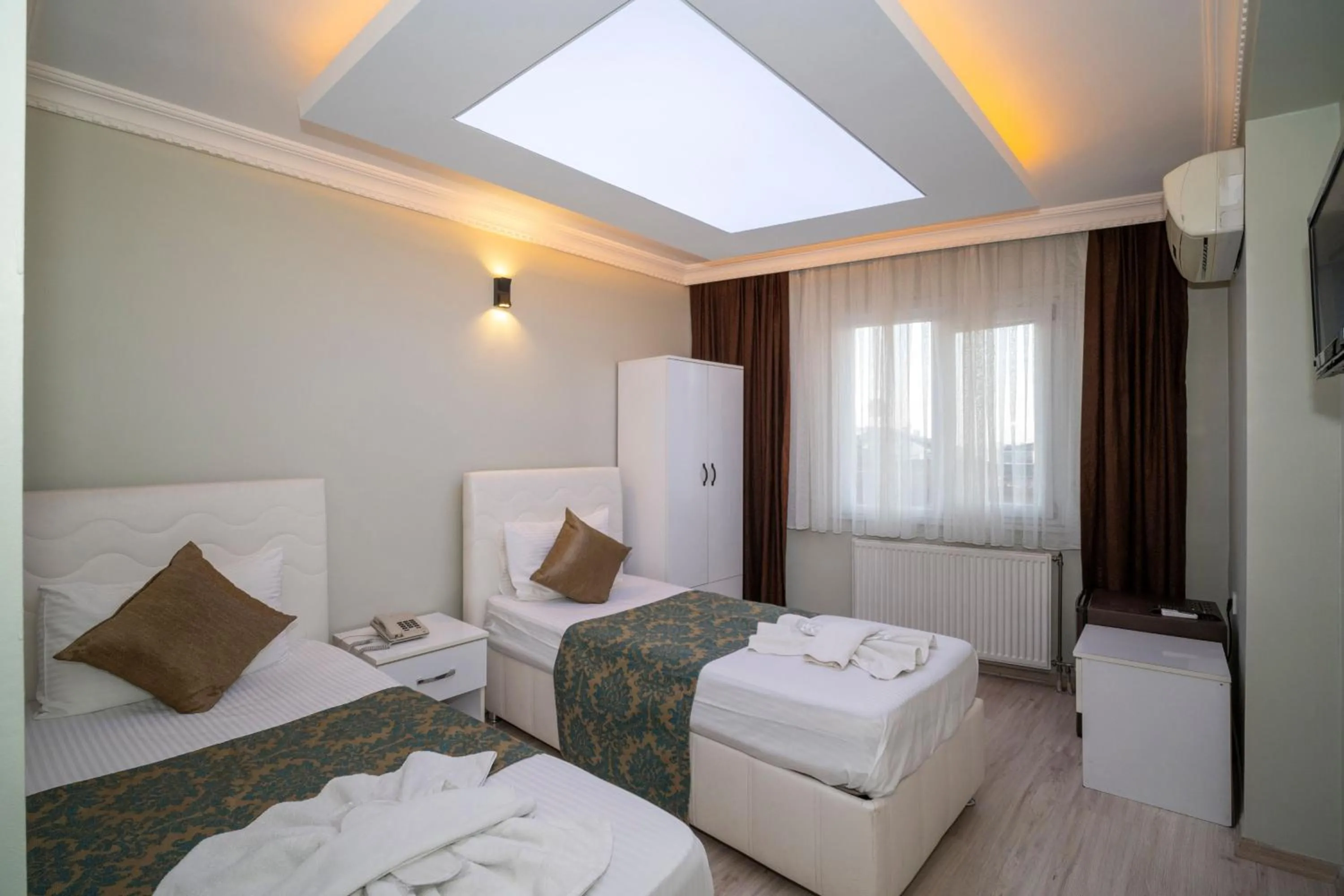 Bed in Hotel Simper