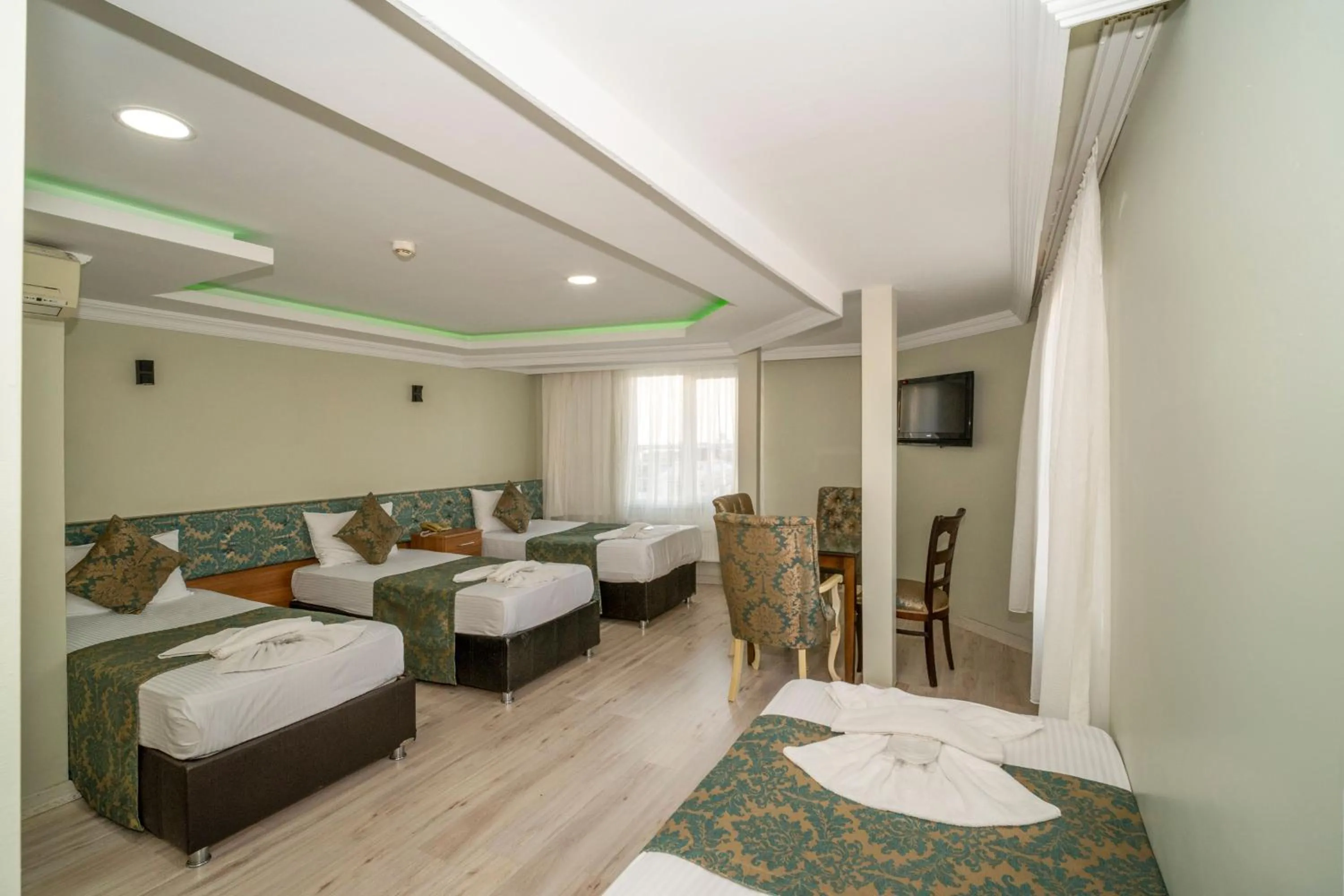 Bed in Hotel Simper