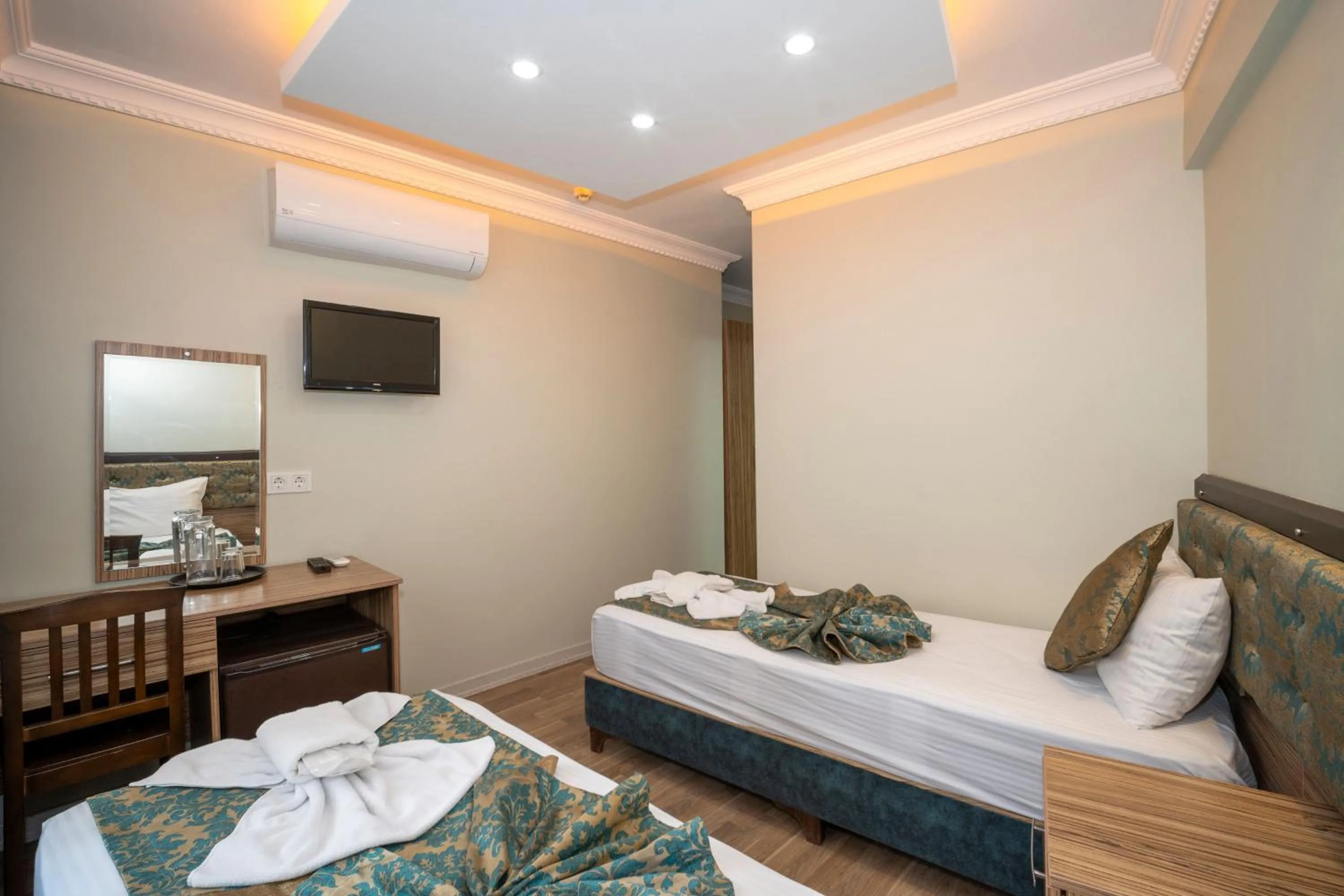 Bed in Hotel Simper