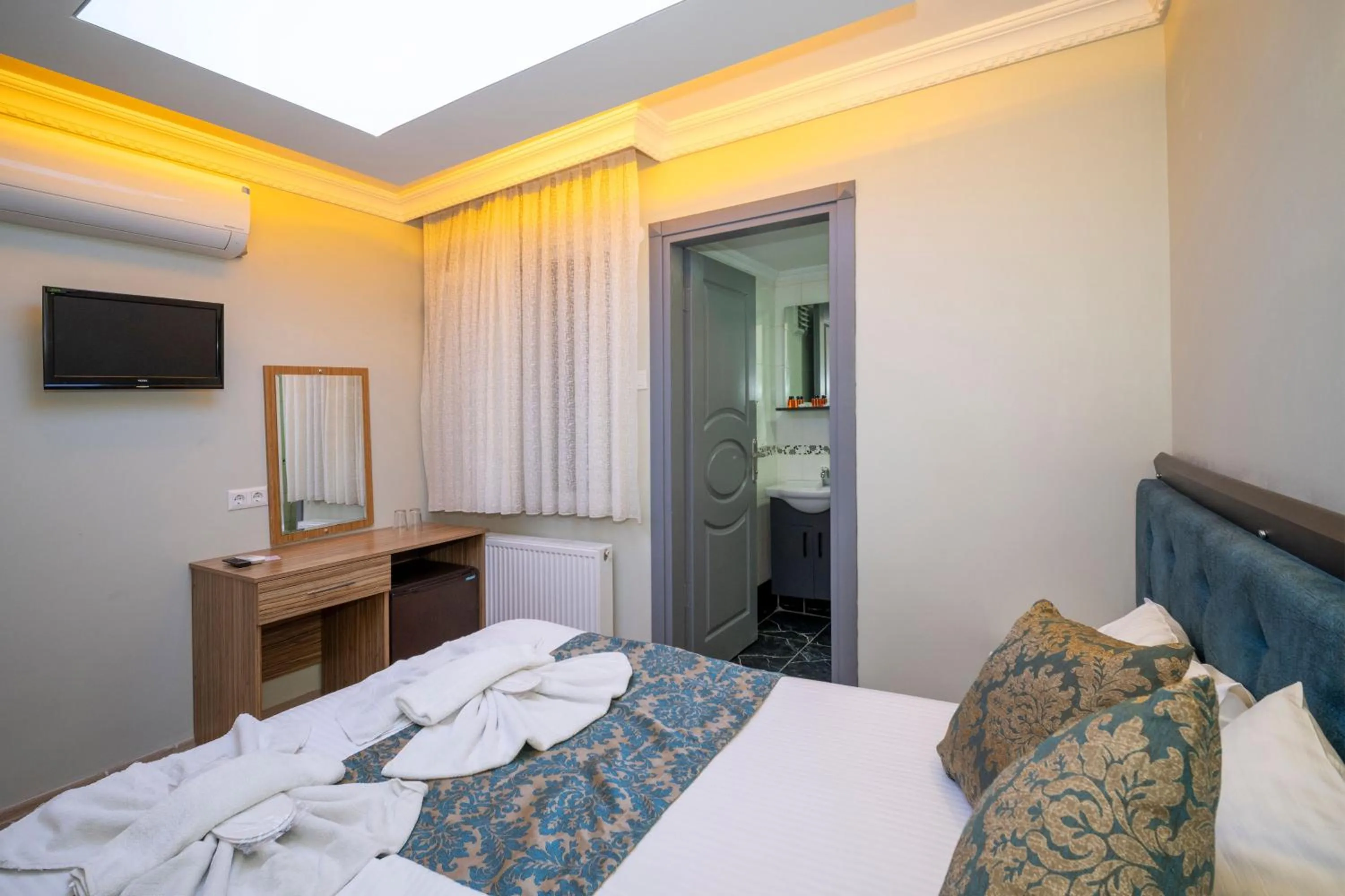 Bed in Hotel Simper