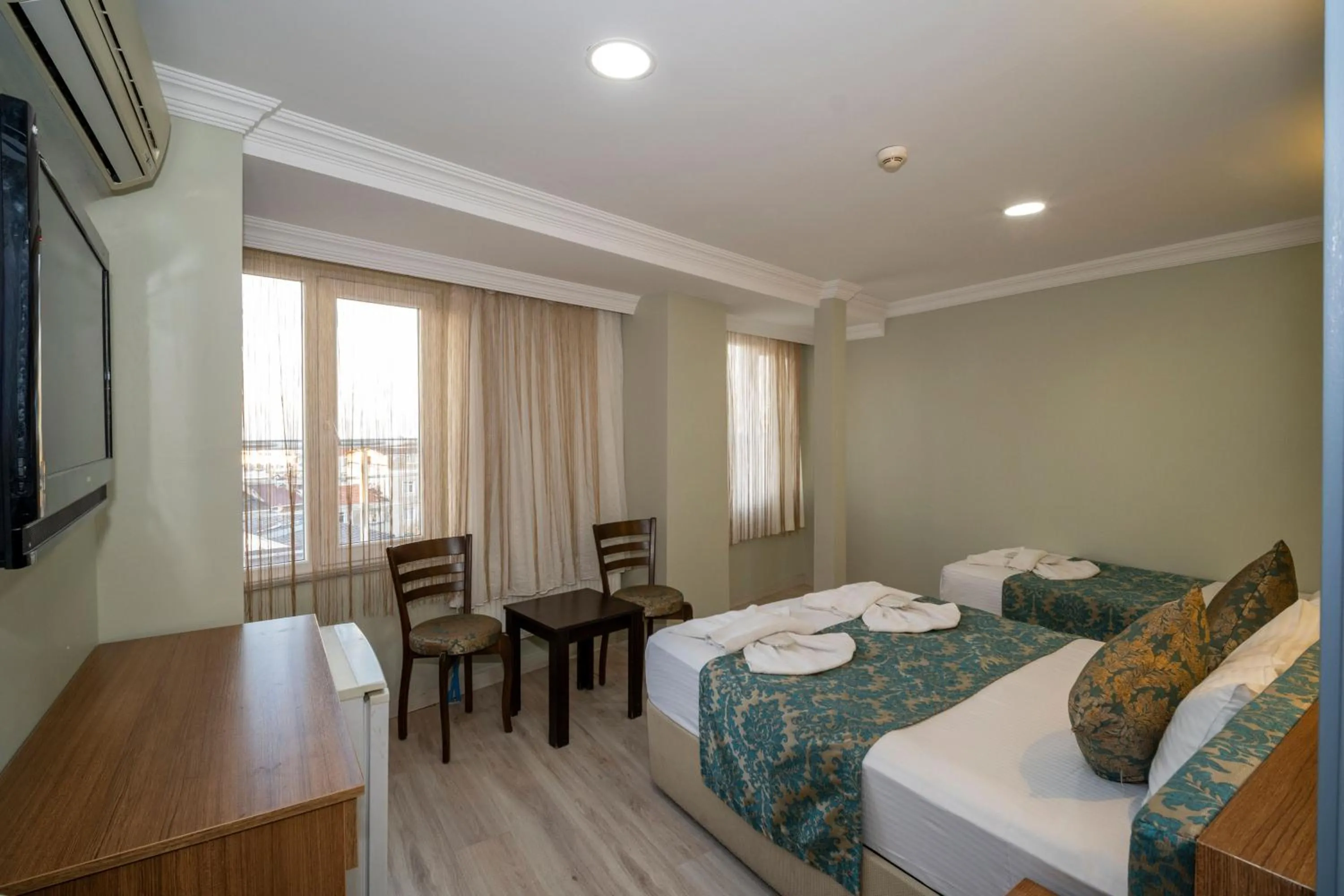 Bed in Hotel Simper