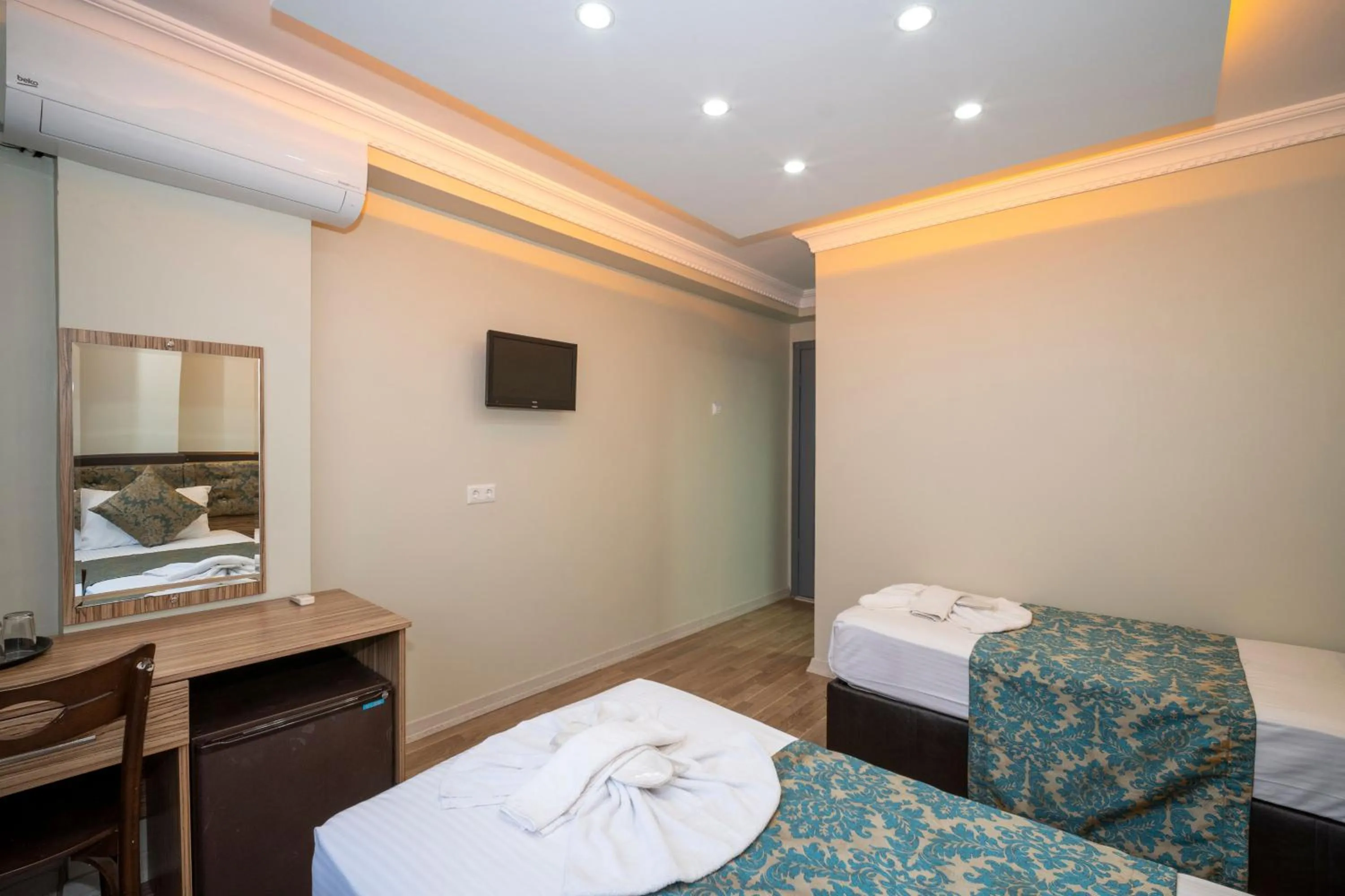 Bed in Hotel Simper