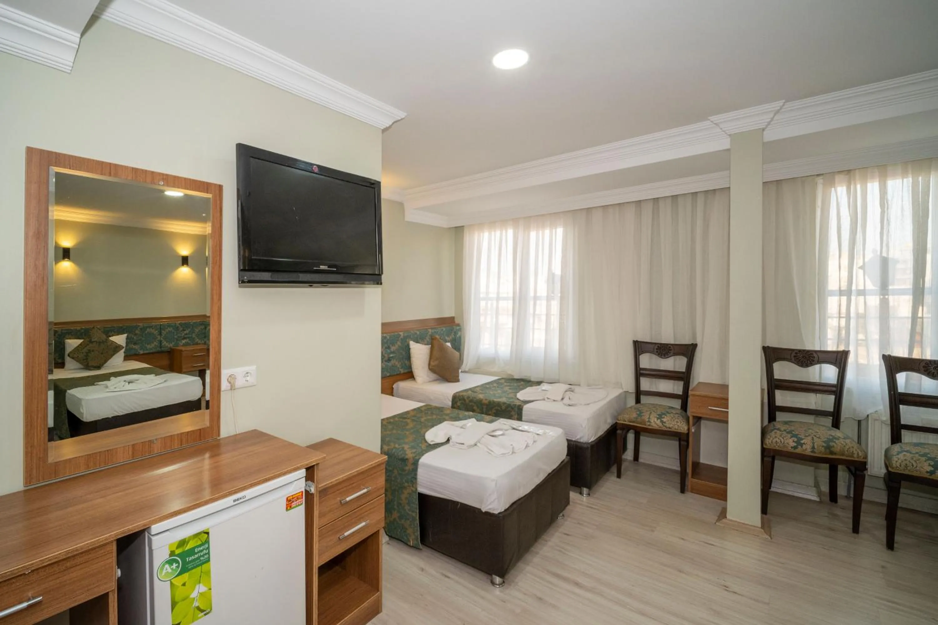 Bed in Hotel Simper
