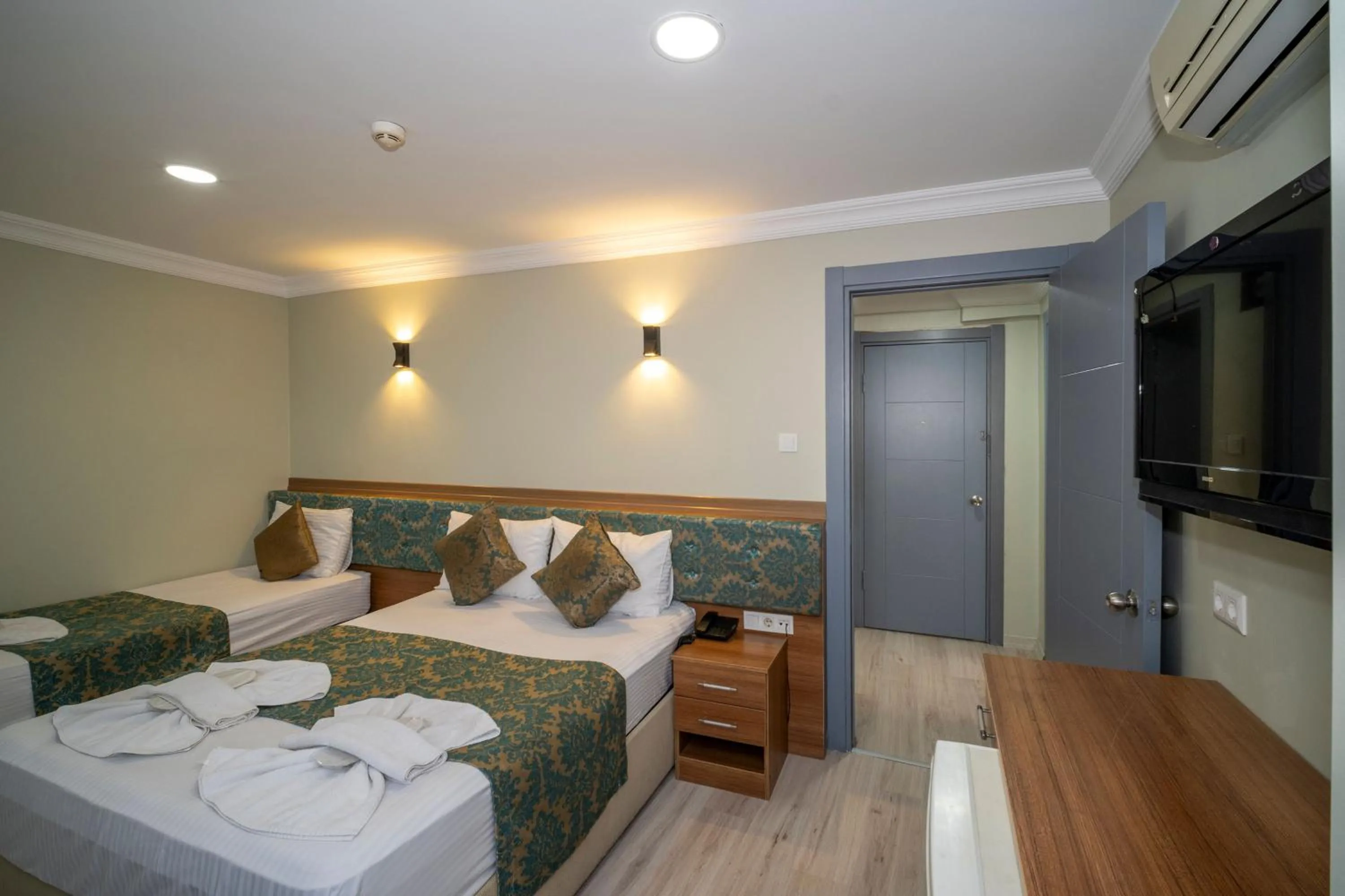 Bed in Hotel Simper