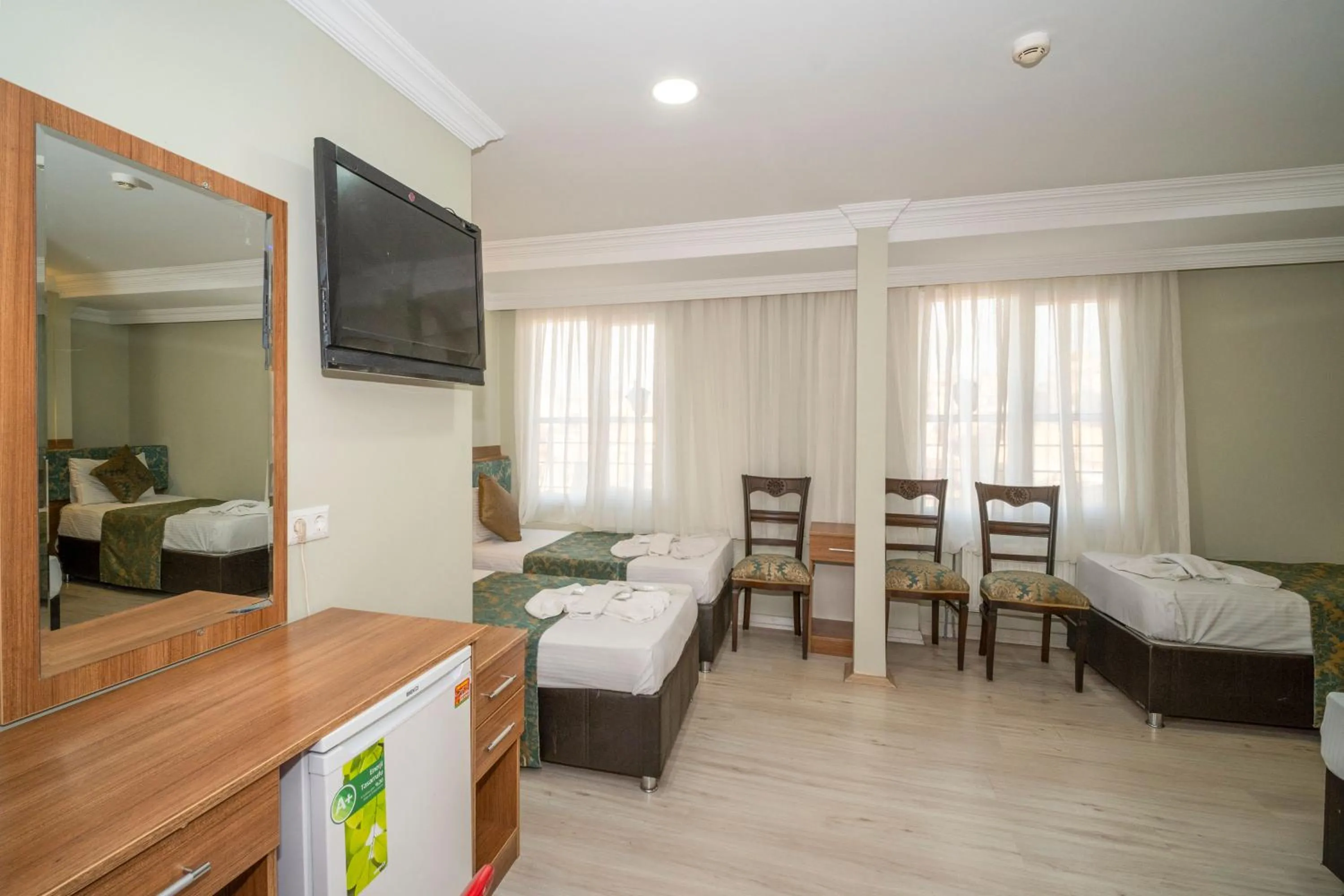 Bed in Hotel Simper