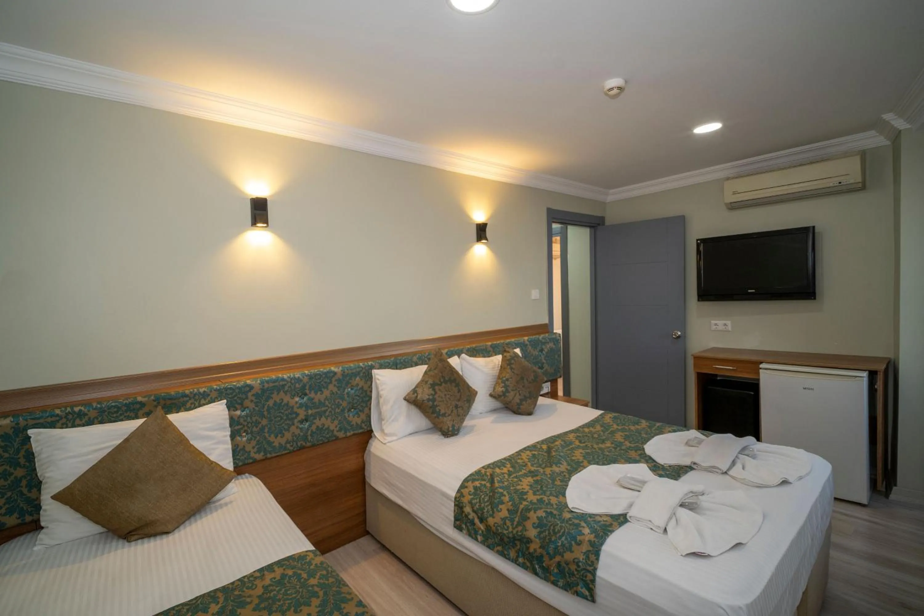 Bed in Hotel Simper