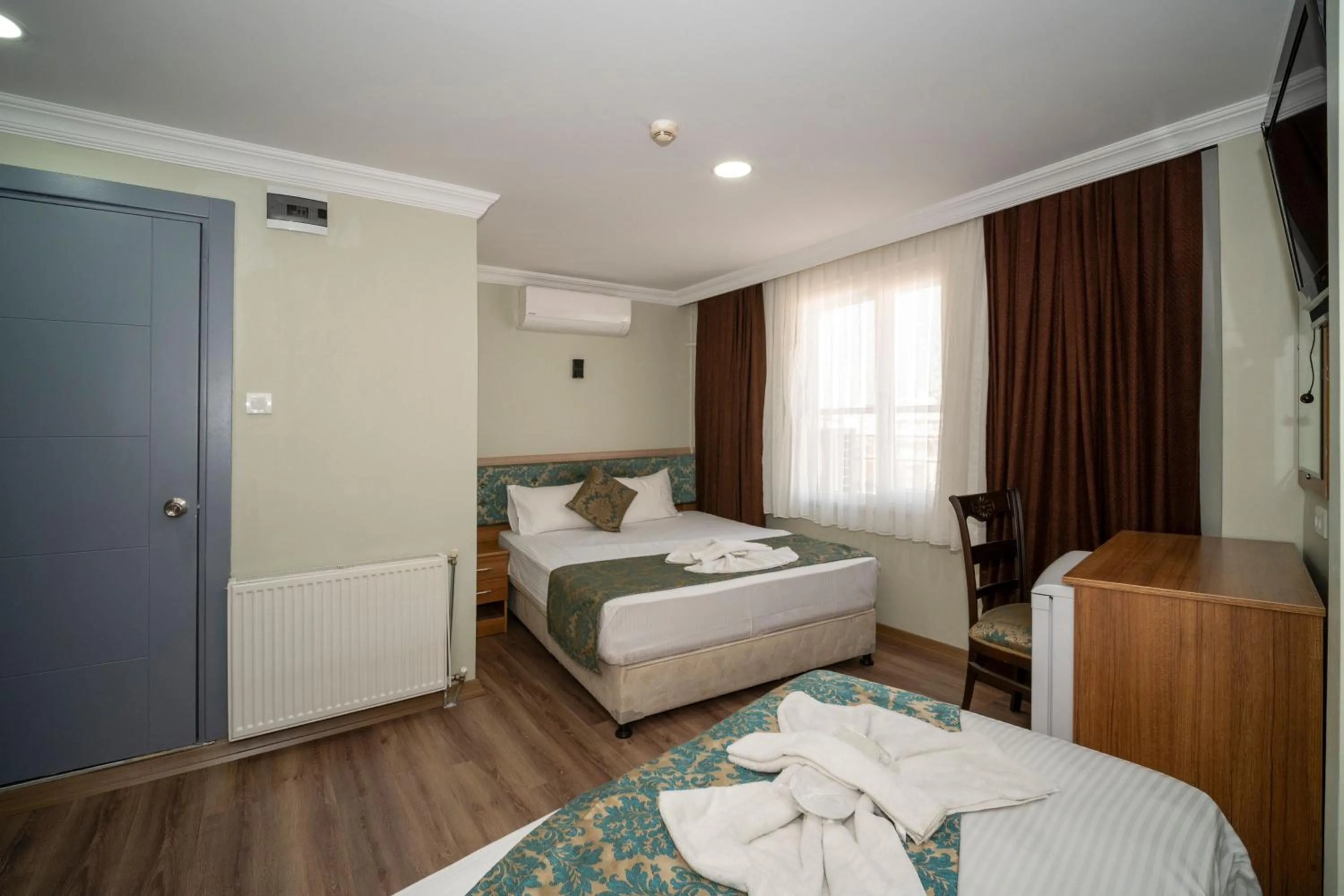 Bed in Hotel Simper