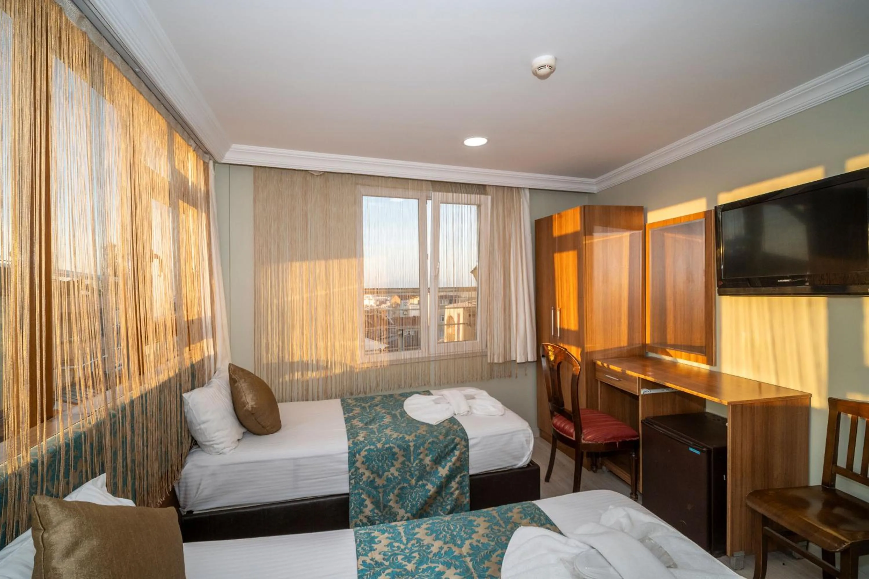 Bed in Hotel Simper