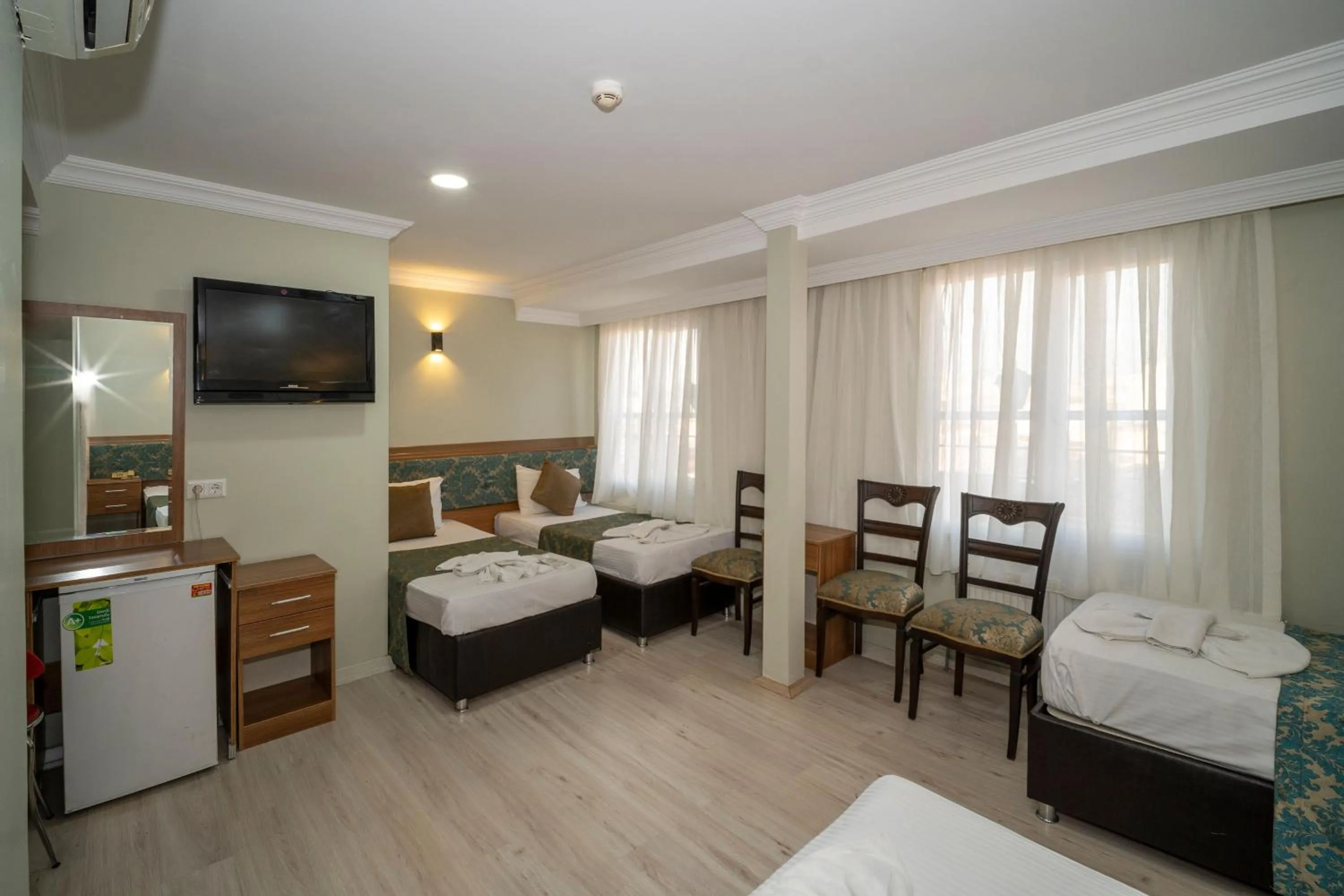 Bed in Hotel Simper