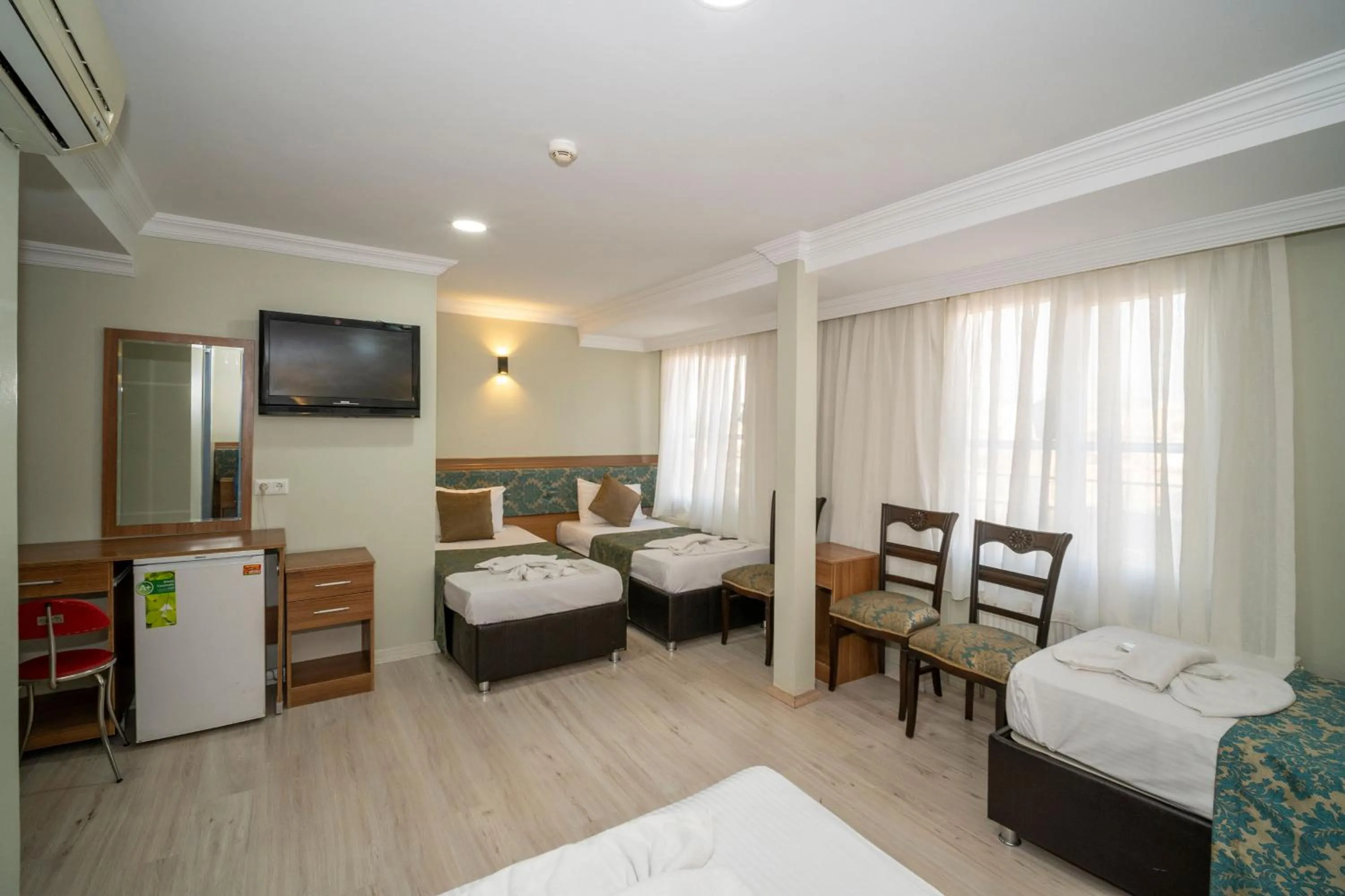 Bed in Hotel Simper