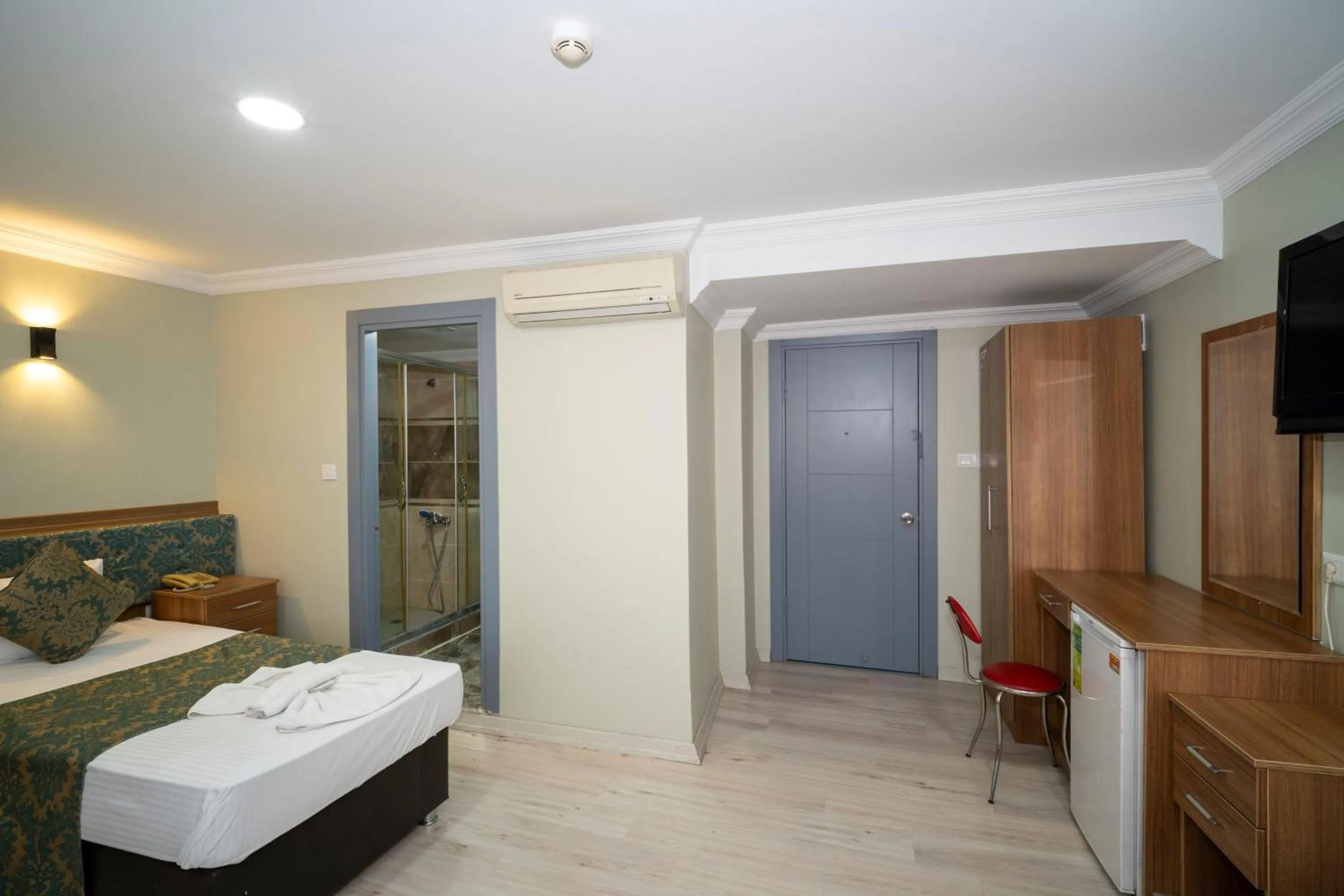 Bed in Hotel Simper