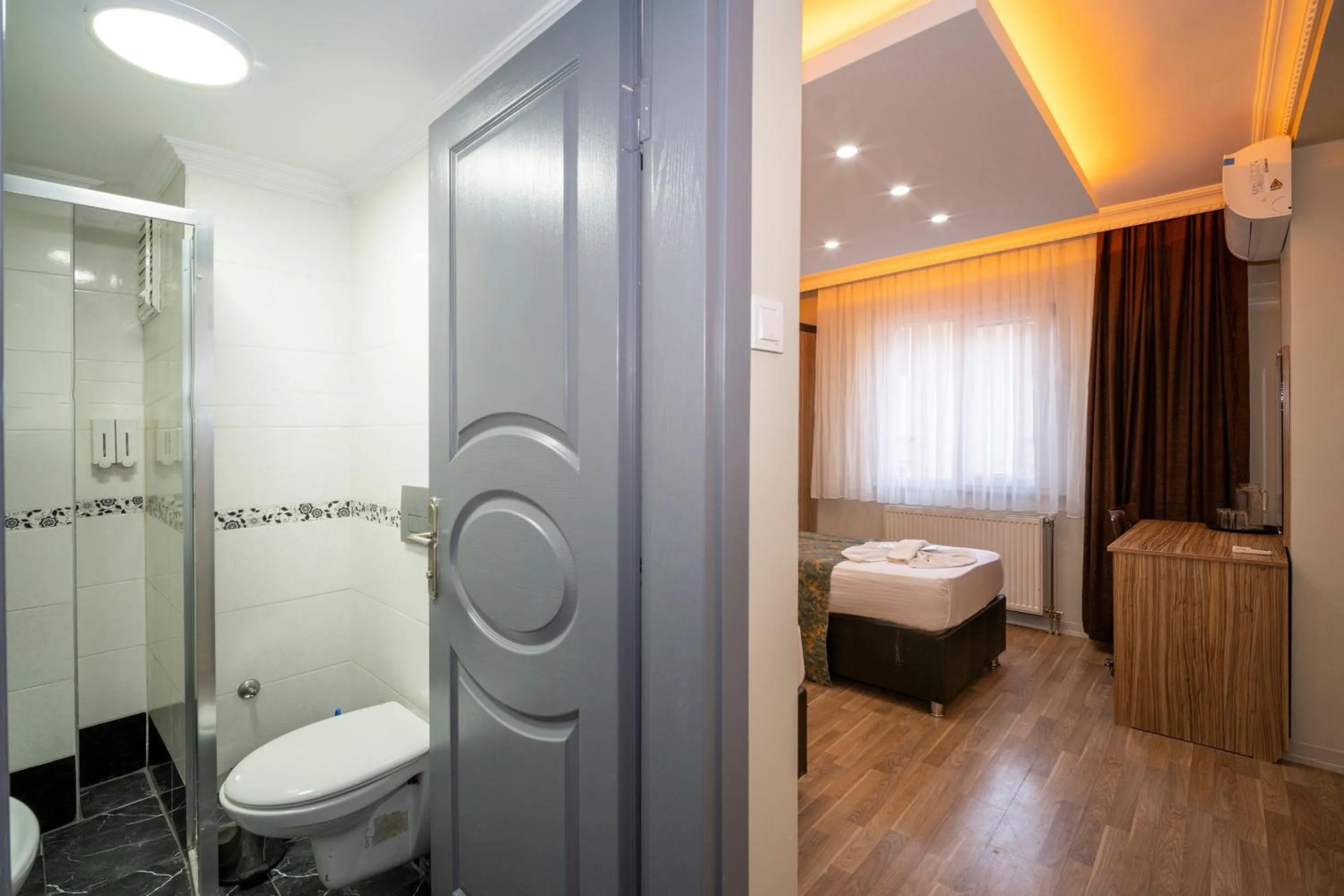 Bed in Hotel Simper