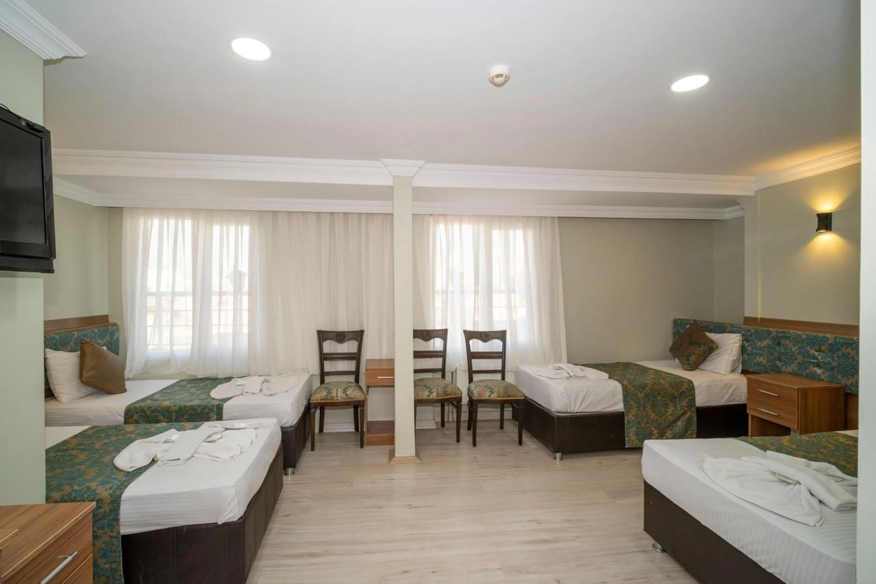 Bed in Hotel Simper