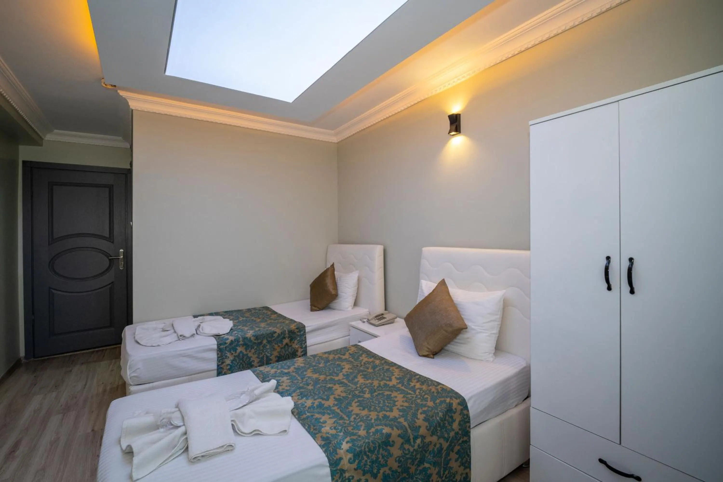 Bed in Hotel Simper
