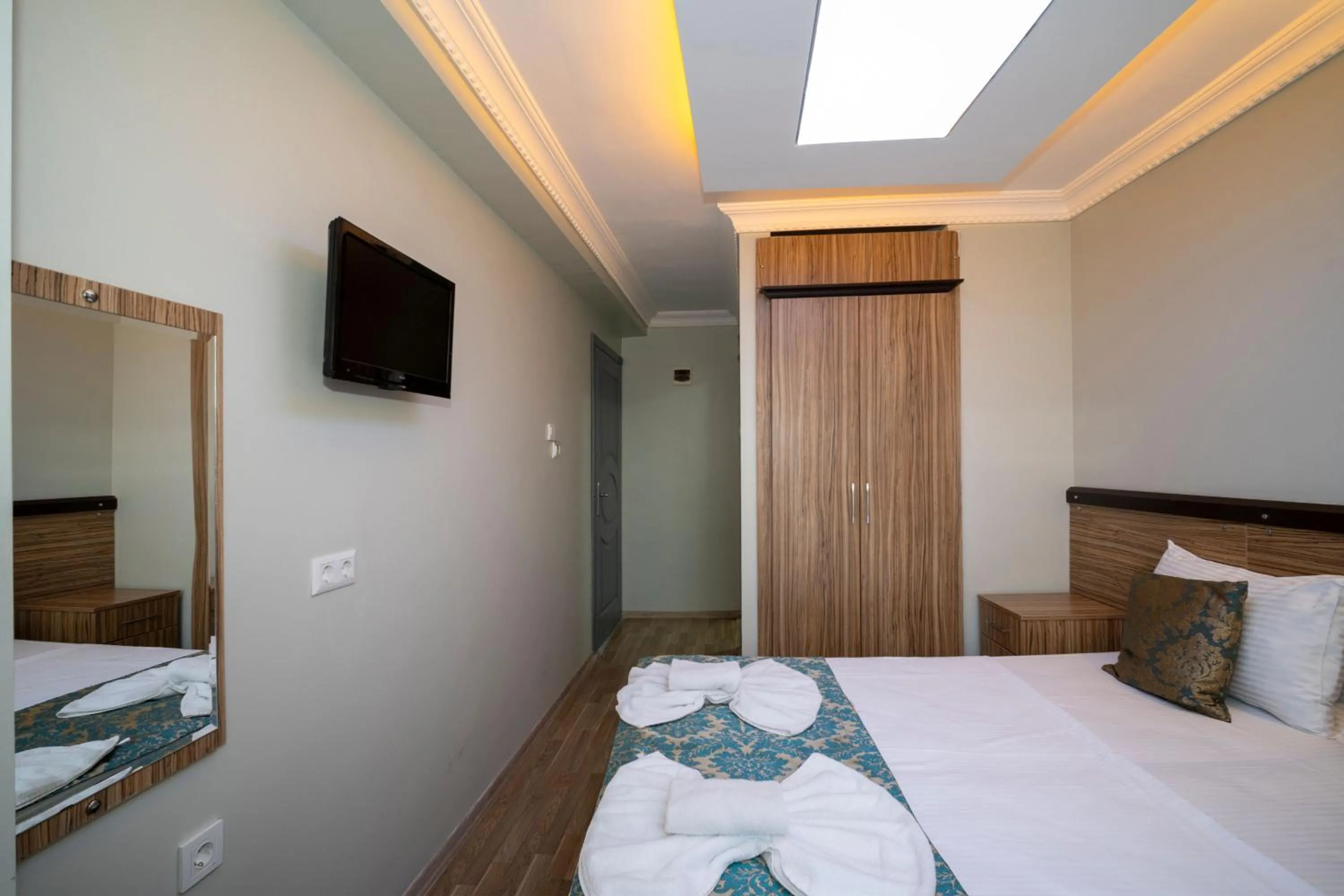 Bed in Hotel Simper