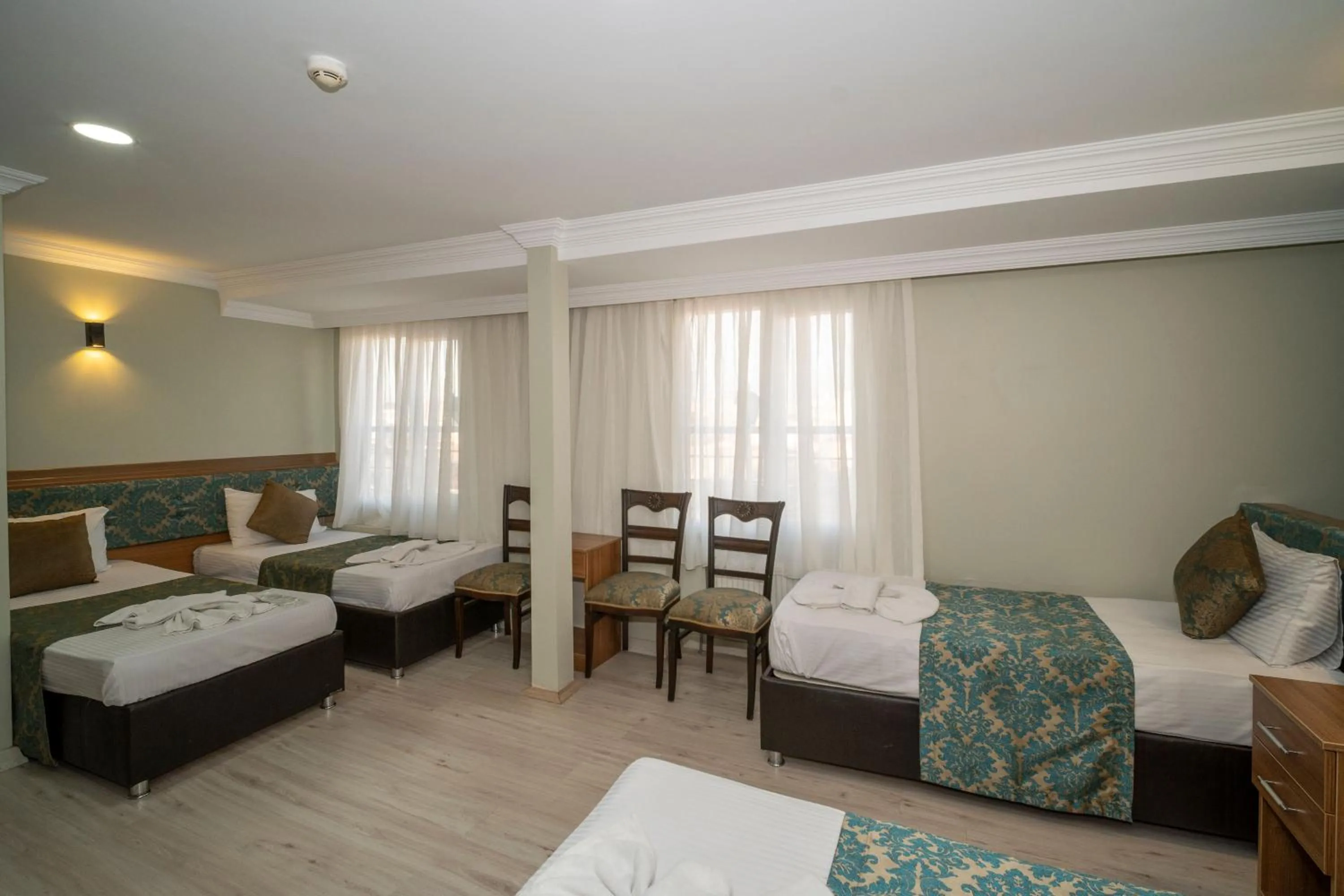 Bed in Hotel Simper