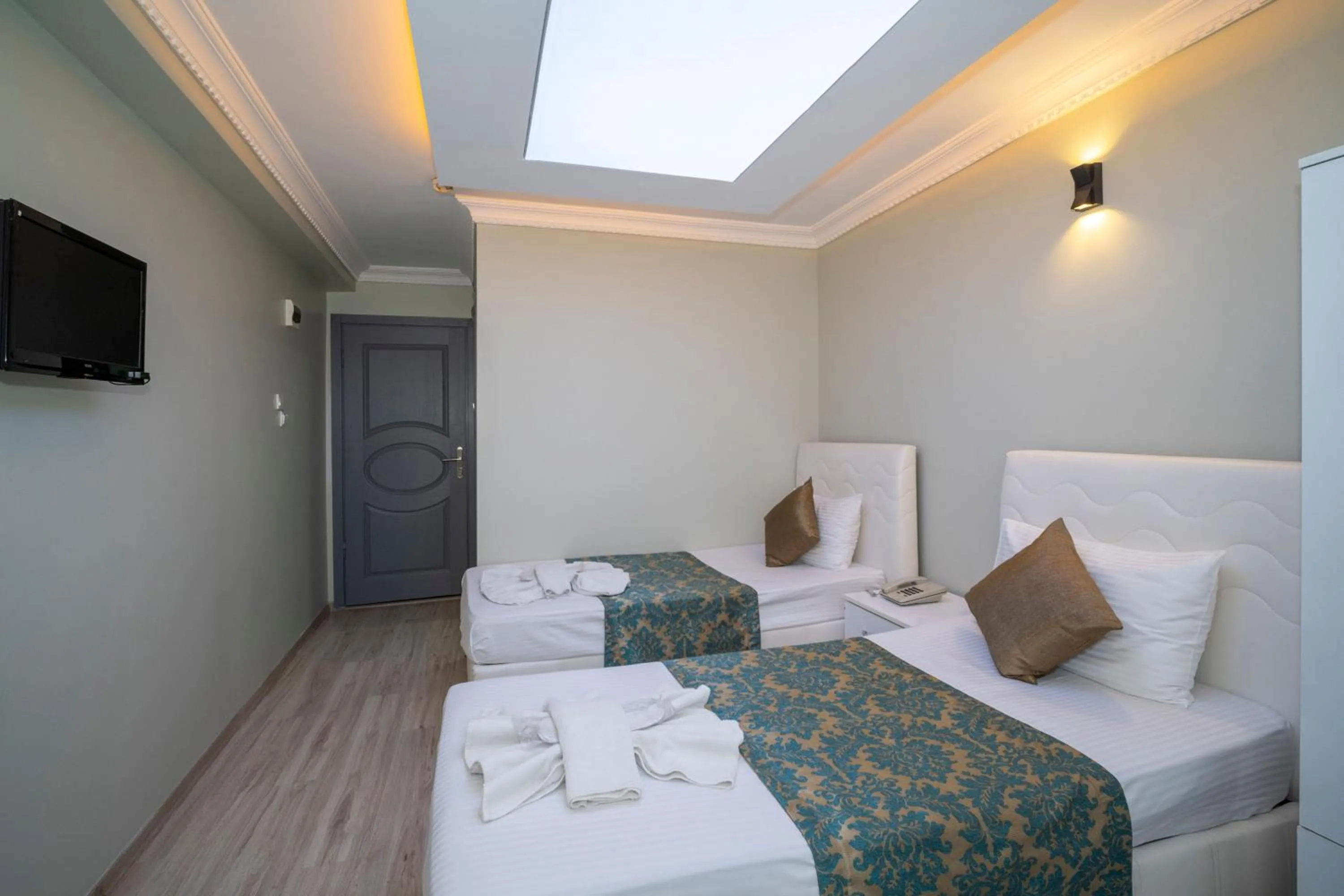 Bed in Hotel Simper
