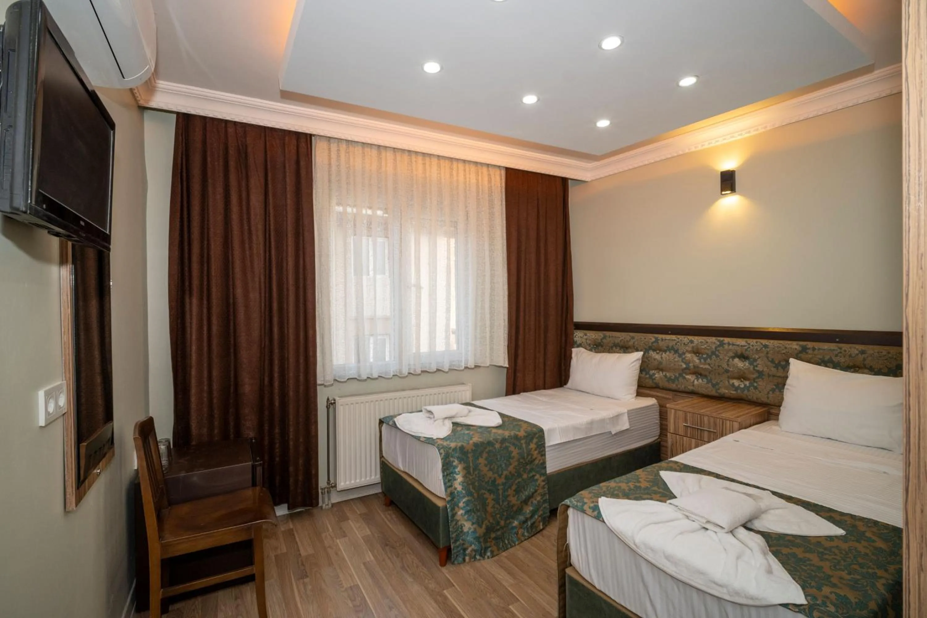 Bed in Hotel Simper