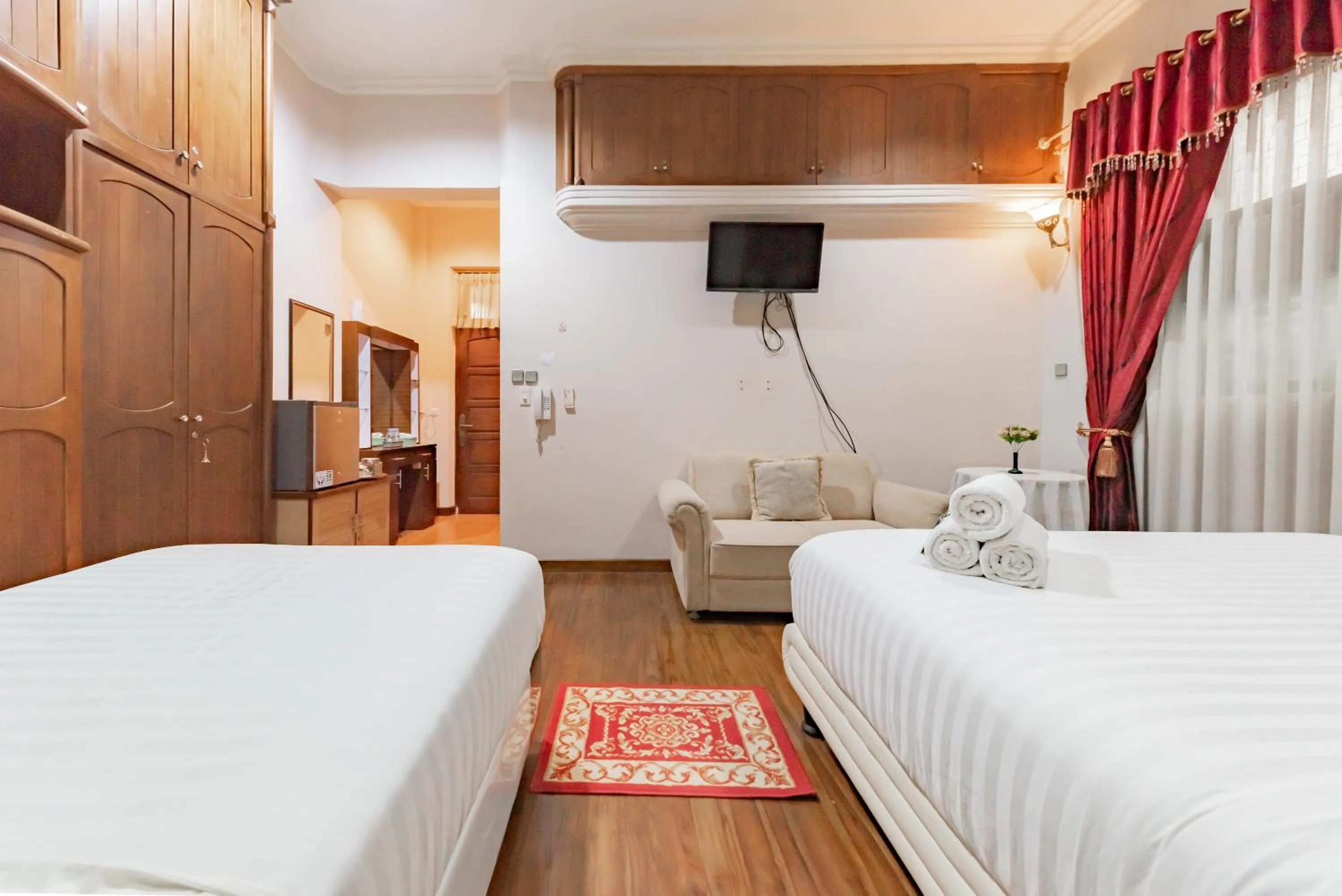 Bedroom, Bed in Urbanview Hotel Villa Surya Bandung