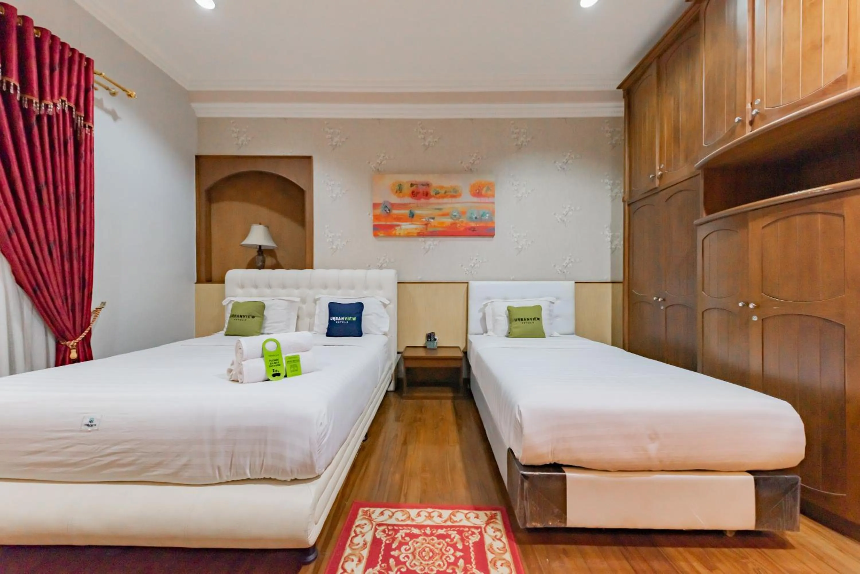 Bedroom, Bed in Urbanview Hotel Villa Surya Bandung