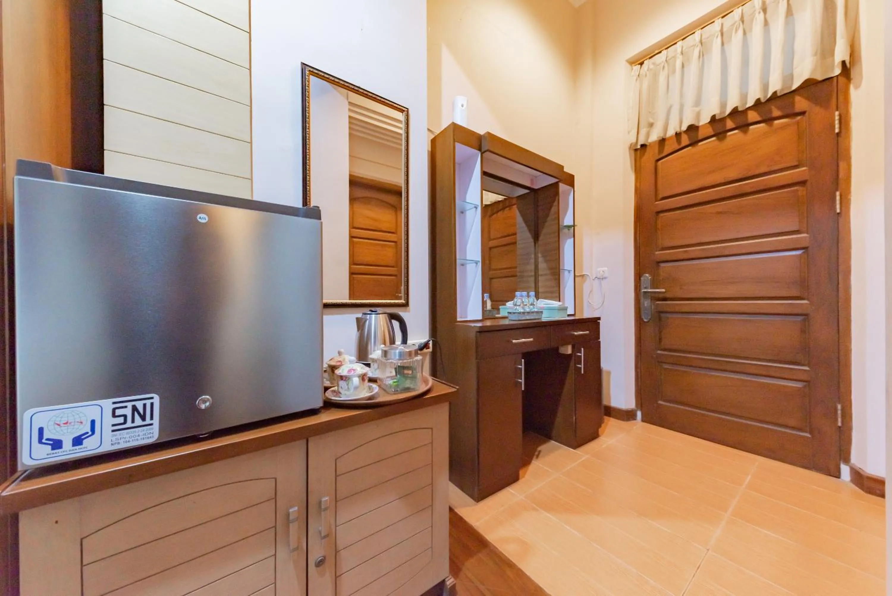 TV and multimedia in Urbanview Hotel Villa Surya Bandung