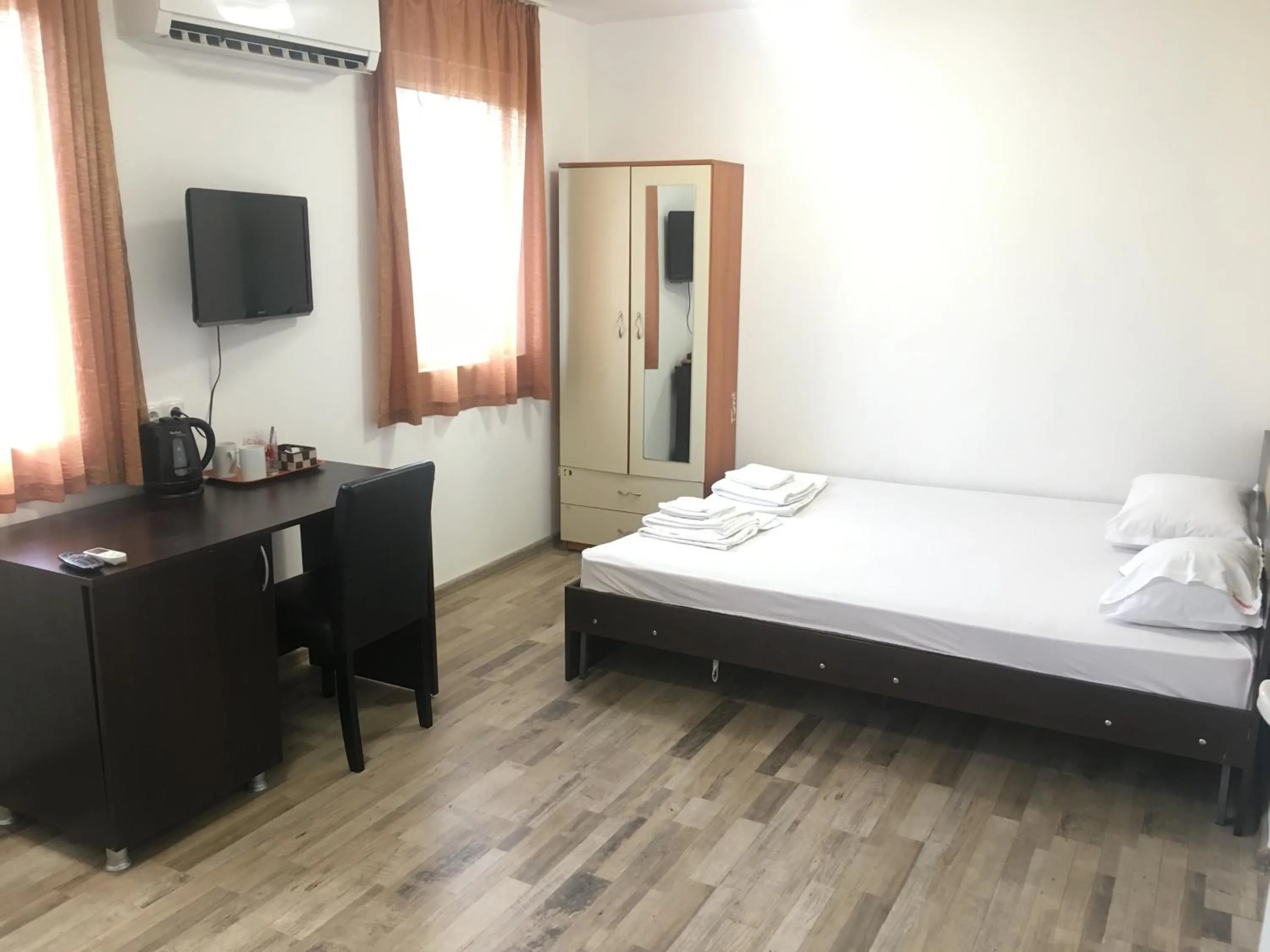 Communal lounge/ TV room, Bed in Samuil Apartments - Central Burgas