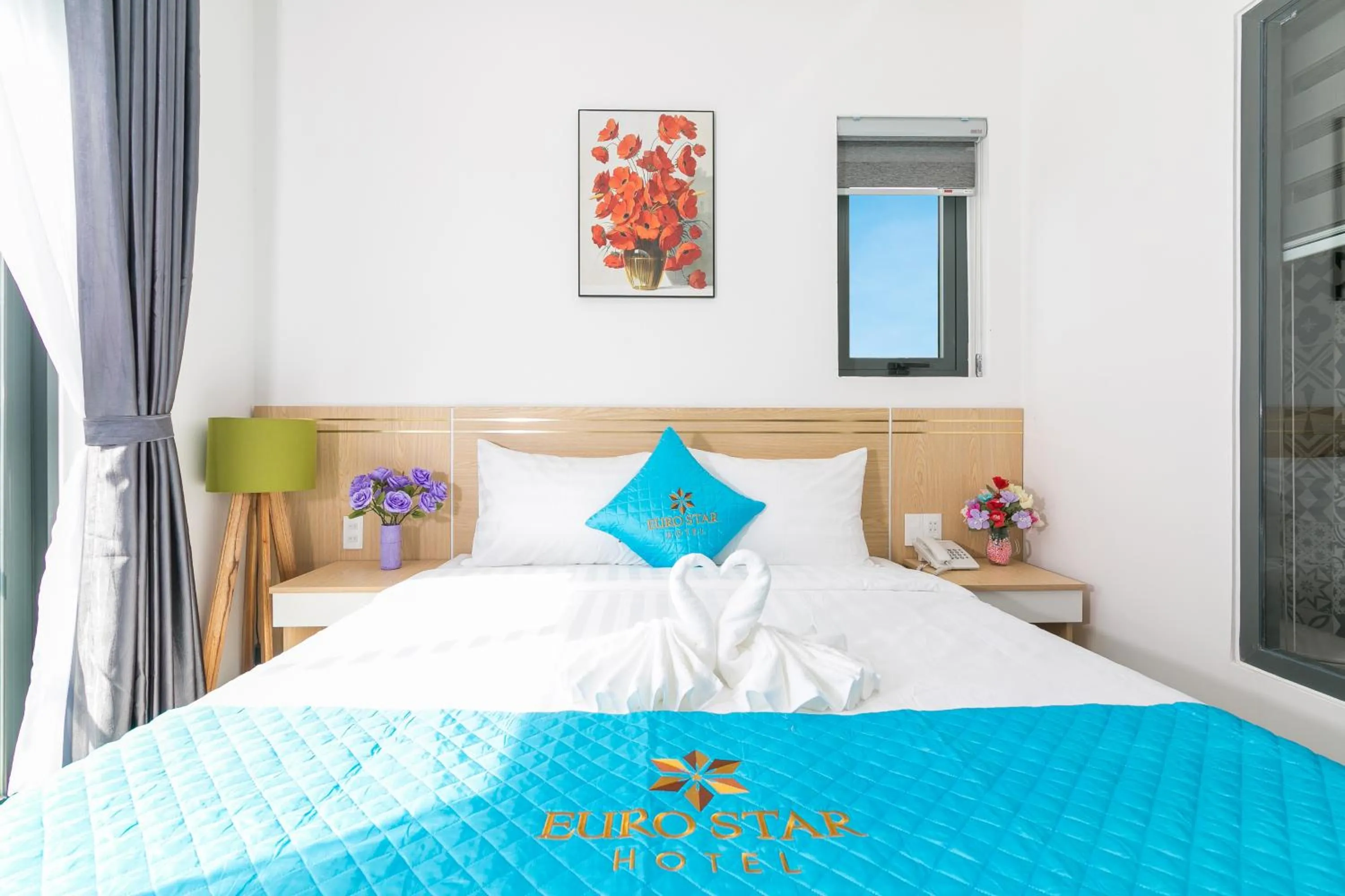 Bed in Euro Star Riverside Hotel